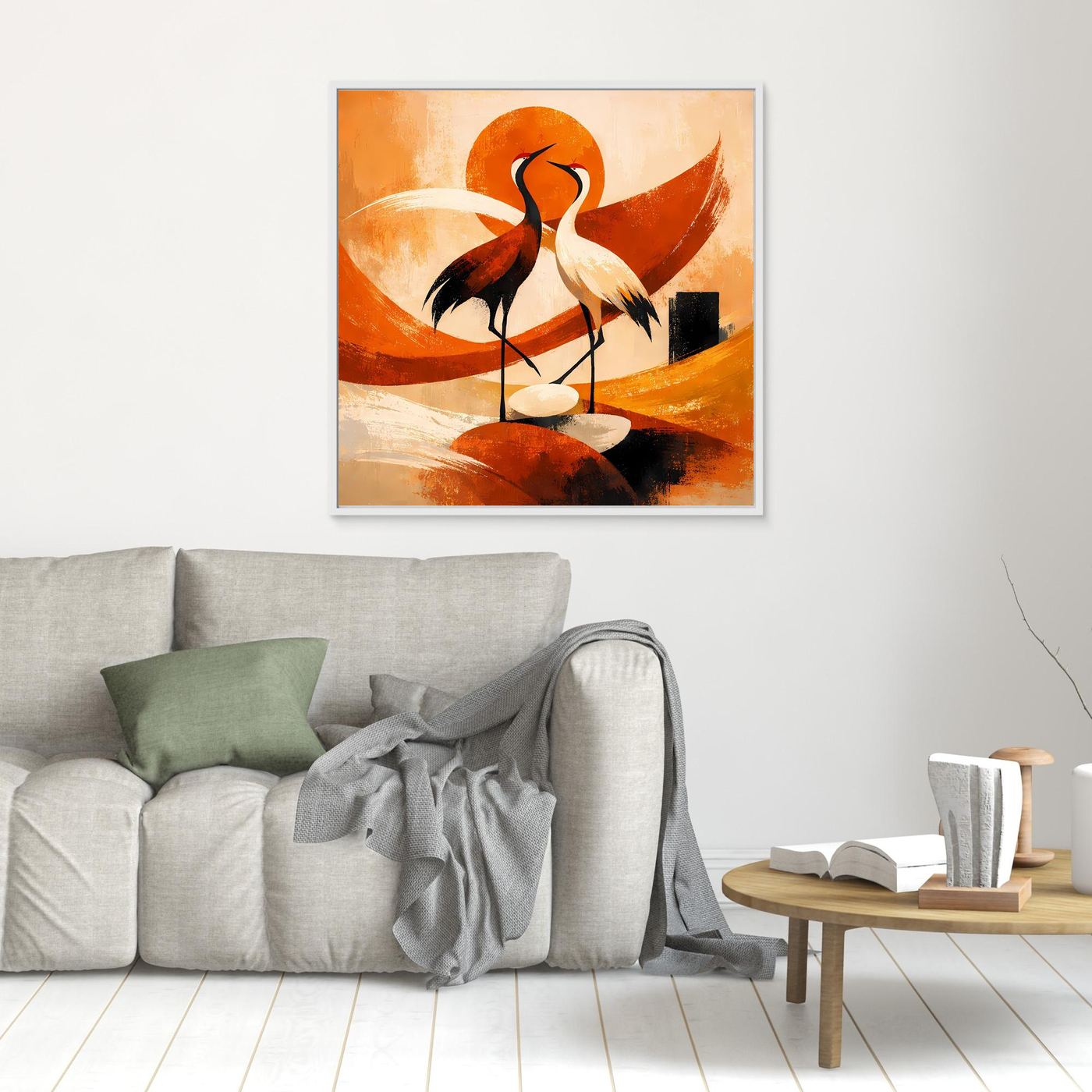 Wandbild mit zwei Kranichen im Sonnenmotiv, orangefarbene Formen, klein weiß gerahmt.