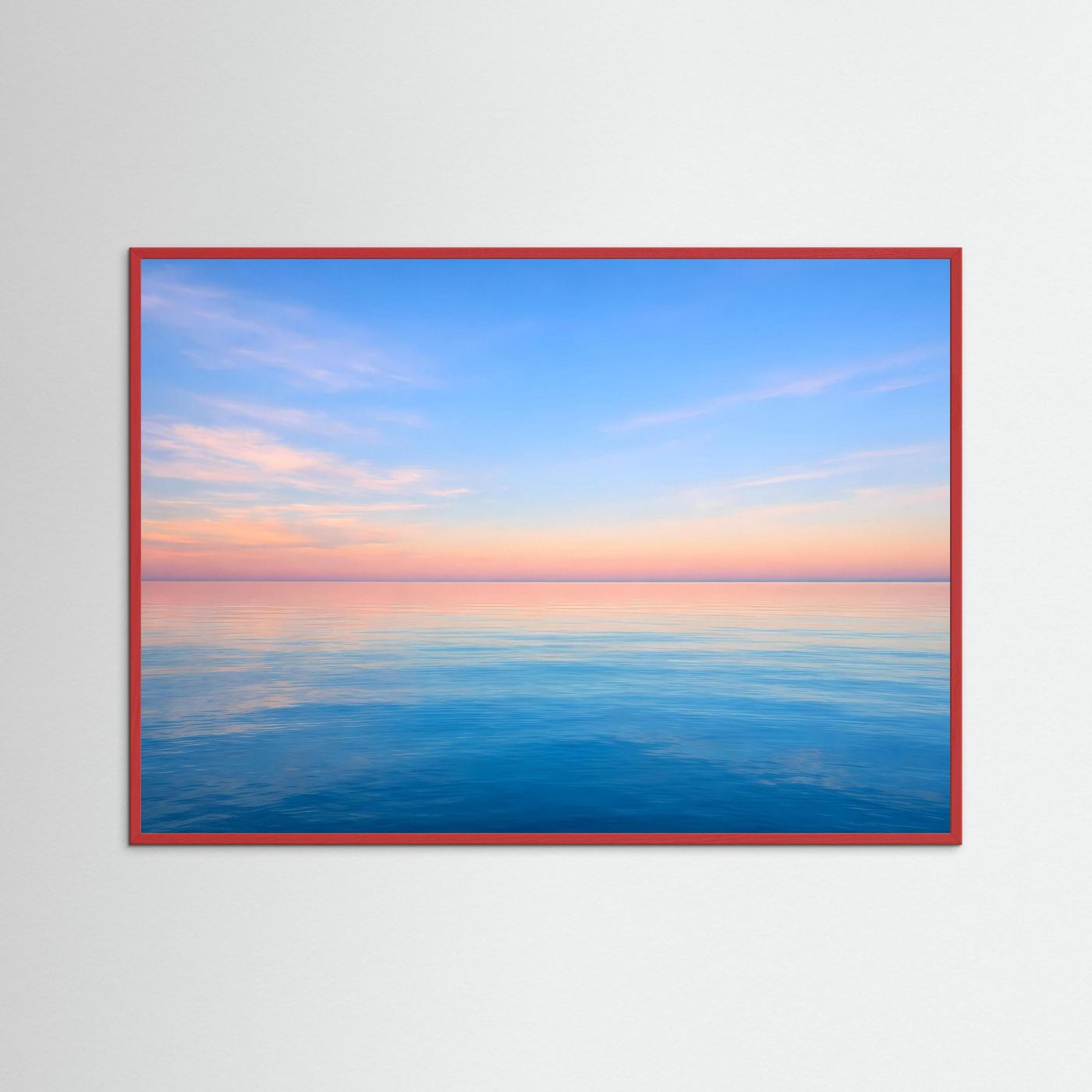 Wandbild mit Meerblick im Abendlicht, roter Rahmen