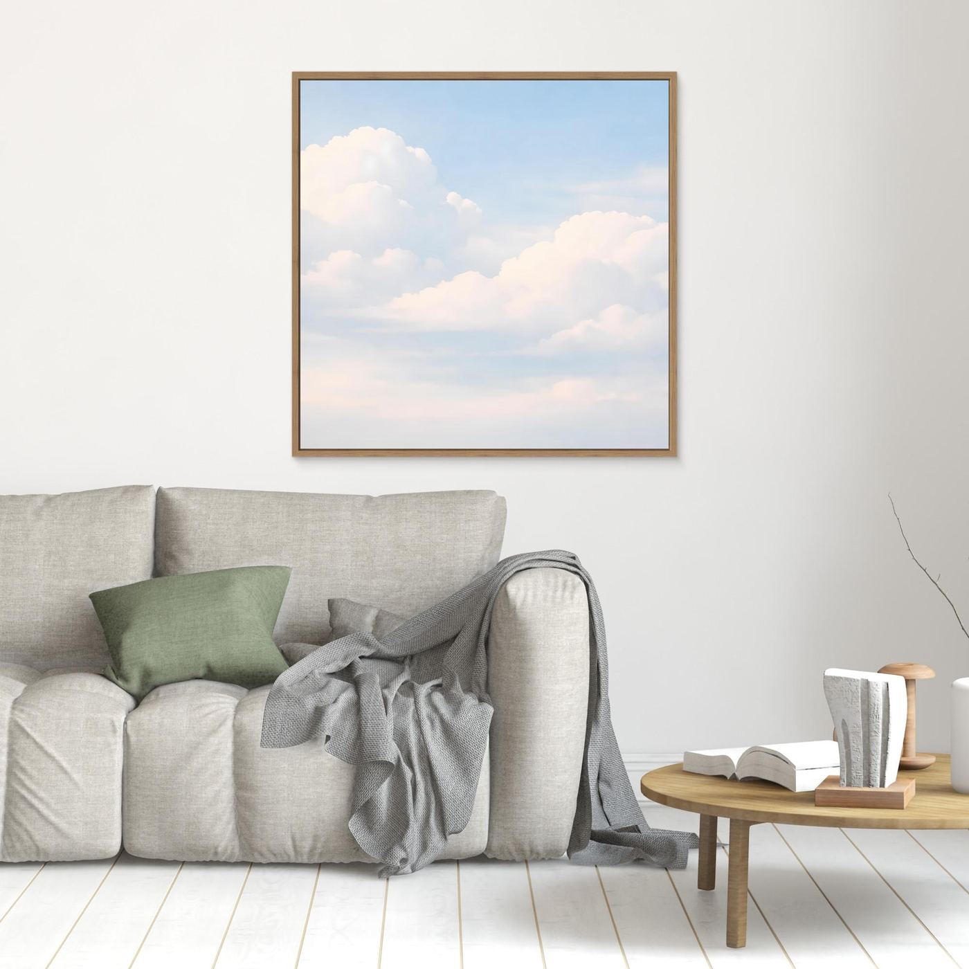 Quadratisches Leinwandbild mit Wolkenmotiv im pastelligen Himmel, brauner Holzrahmen
