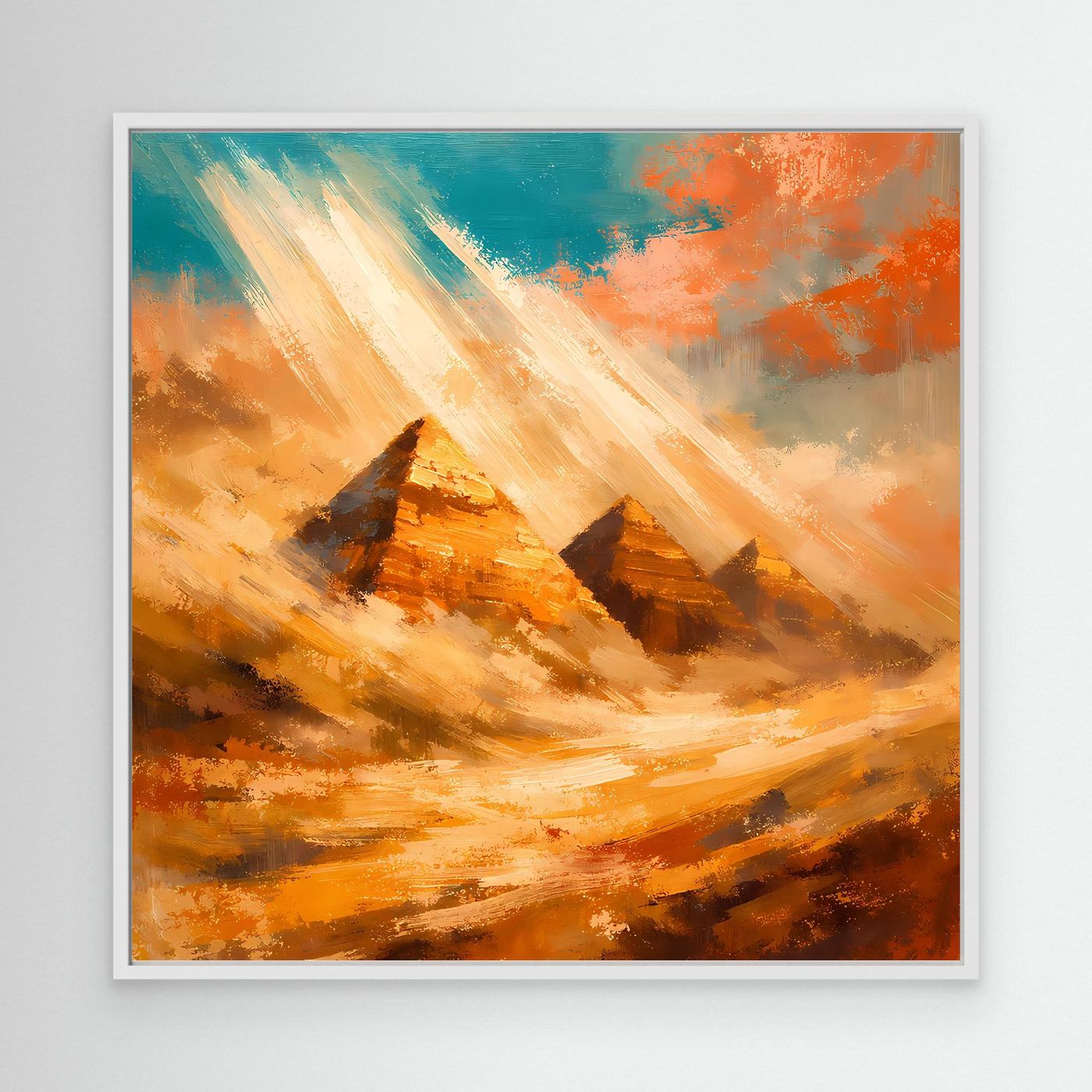 Abstraktes Leinwand-Wandbild mit Pyramiden und Sonnenstrahlen in warmen Wüstenfarben, im weißen Rahmen