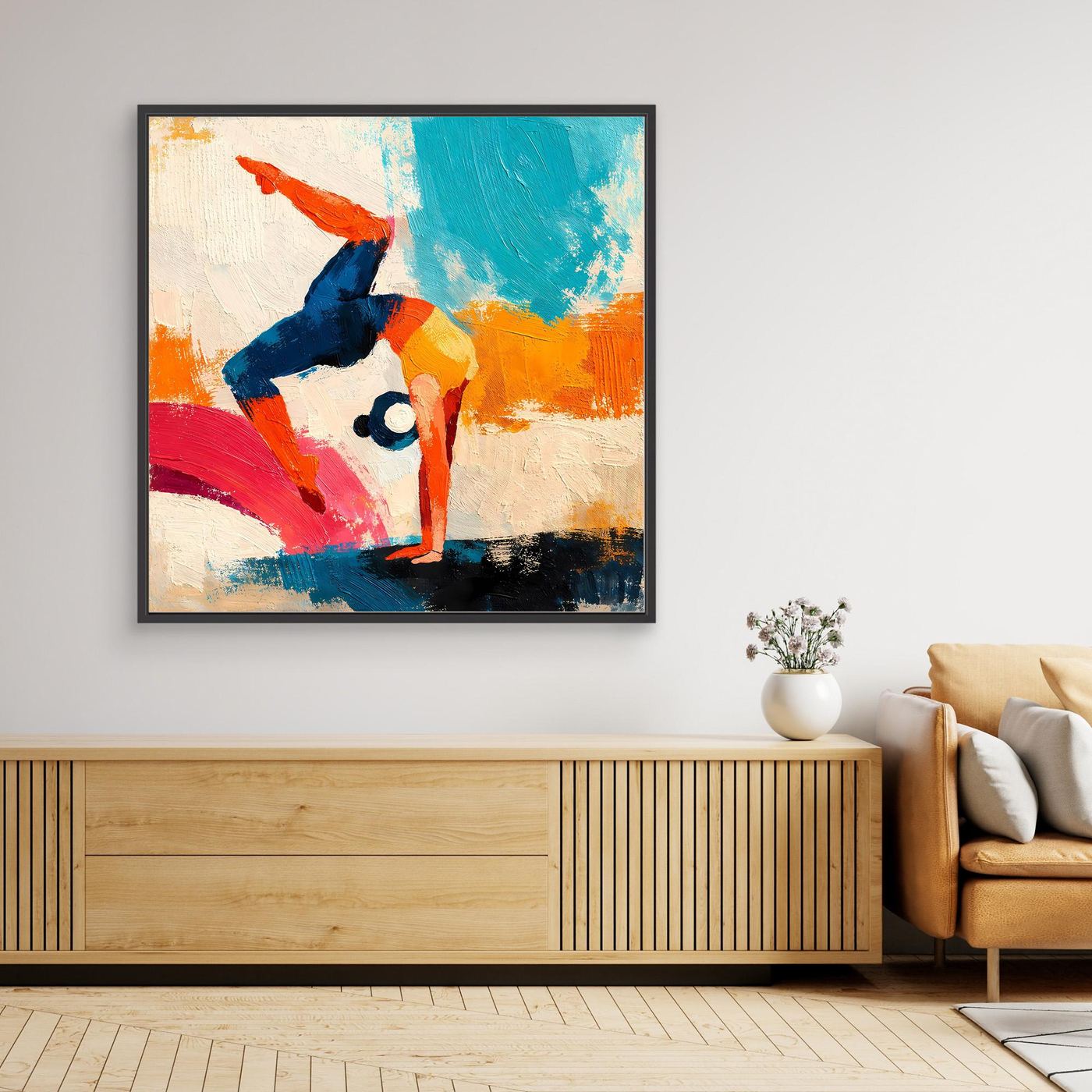 Framed canvas wall art featuring an abstract handstand gymnast with orange, blue, and navy