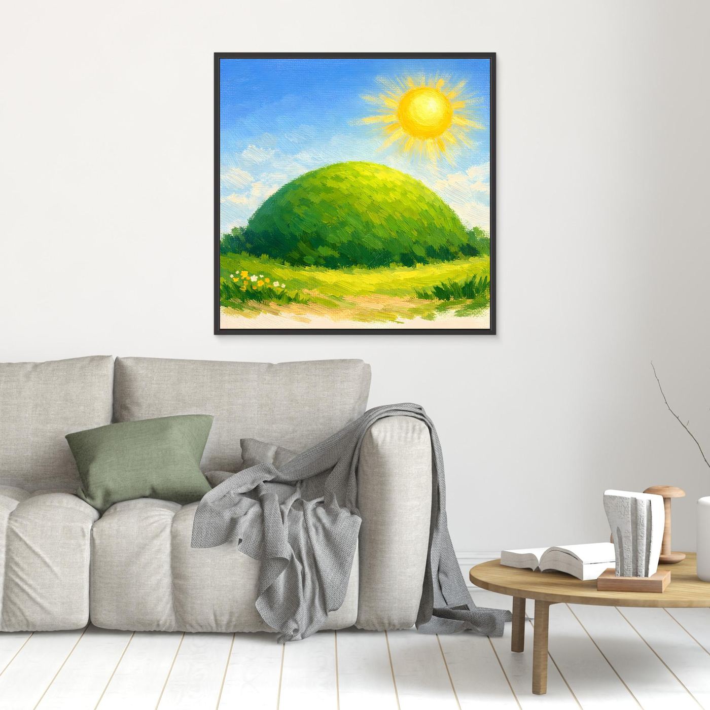 Kleines Leinwandbild mit grünem Hügel und gelber Sonne, im schwarzen Rahmen