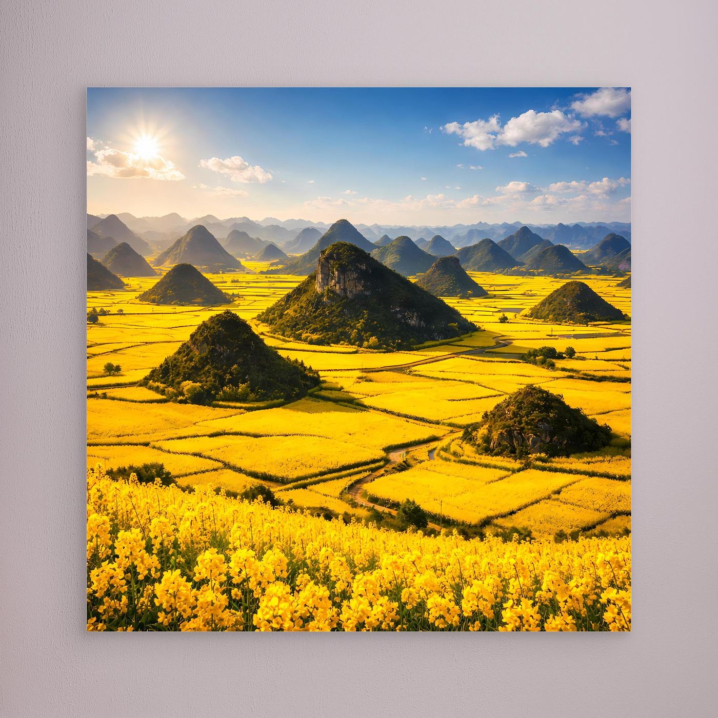Leinwandbild: goldenes Rapsfeld mit Karstbergen, rahmenlos.