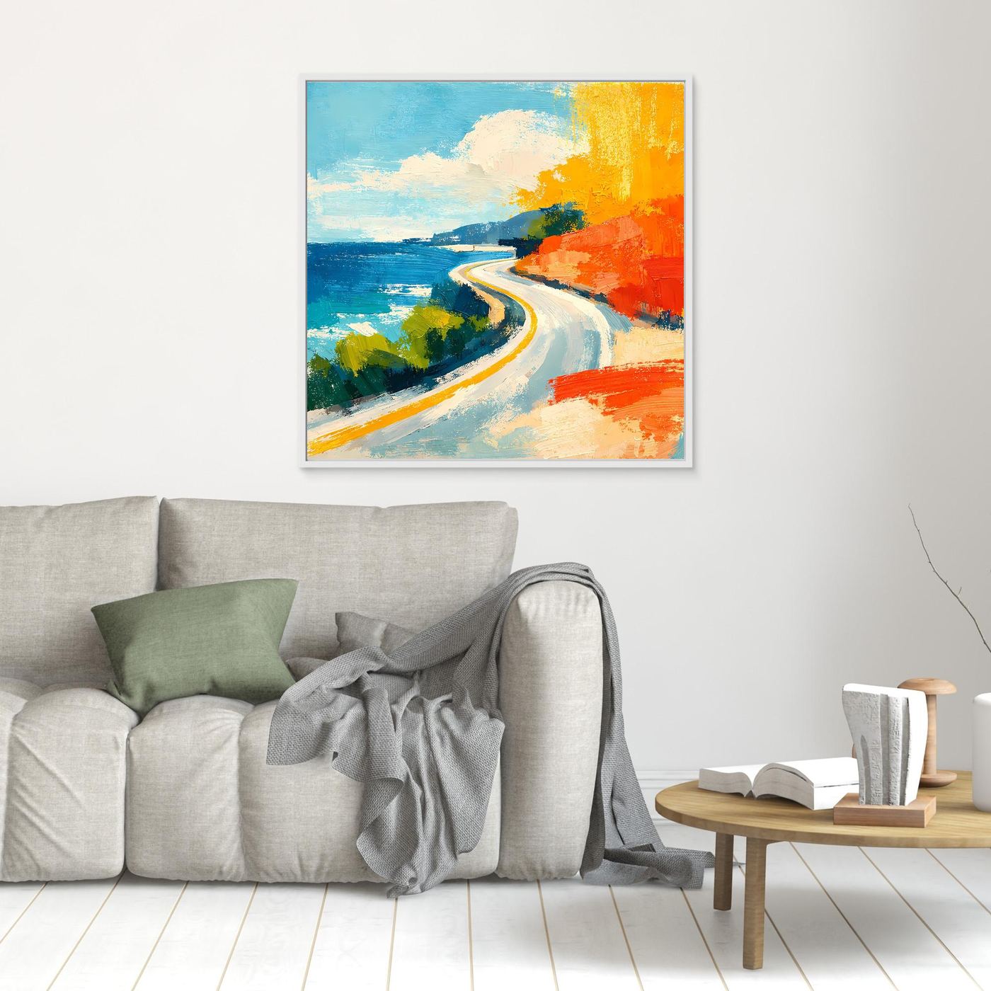 Small coastal abstract wall art with white frame, blue water, curving road, orange shoreline