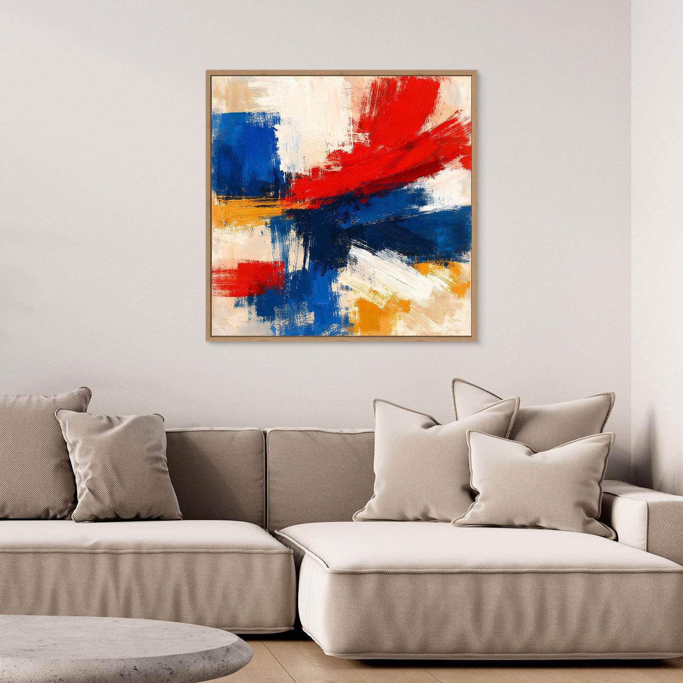 Abstract wall art canvas with blue, red, white, and yellow brush strokes; light wood frame