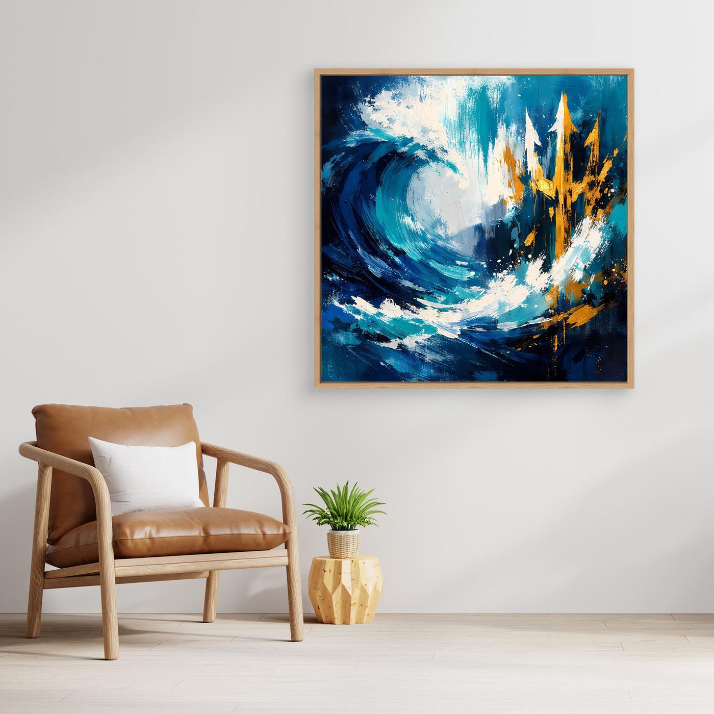 Square nautical wall art with blue waves and golden trident on wall, gold frame