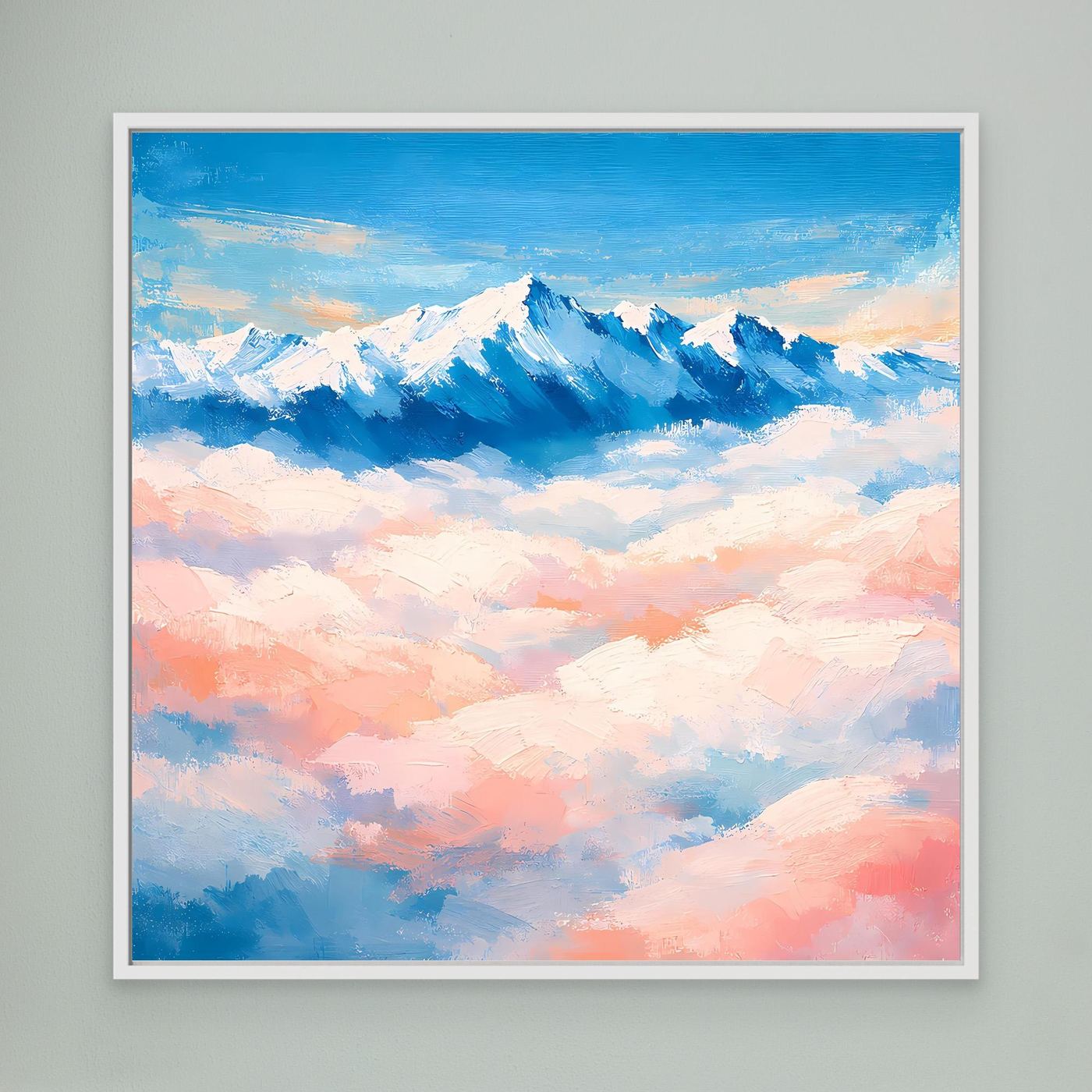 Leinwand-Wandbild mit schneebedeckten Bergen über wolkigem Himmel, weiß gerahmt