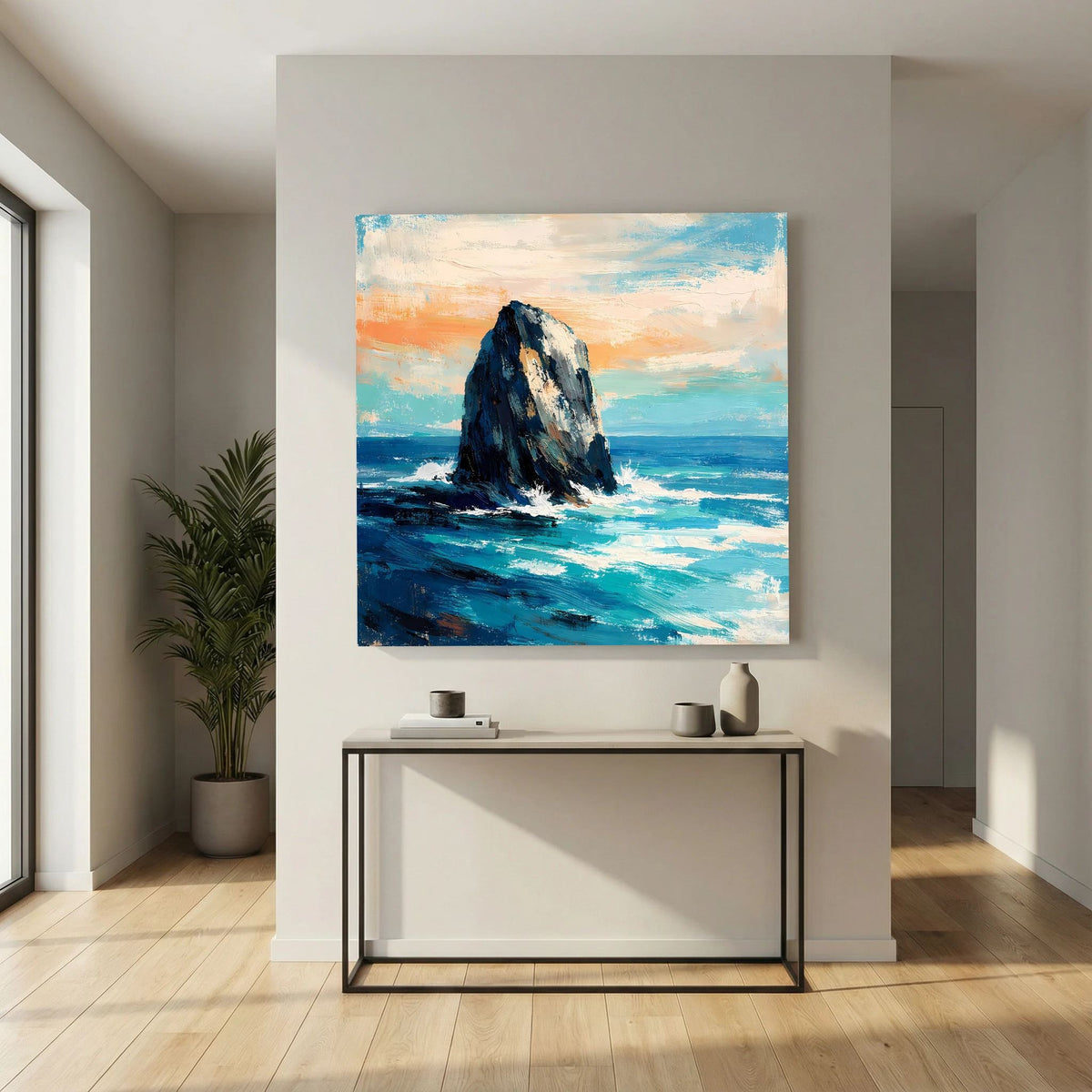 Quadratisches Leinwandbild mit Felsen in der Brandung, blaues Wasser und orangefarbener Himmelshintergrund.