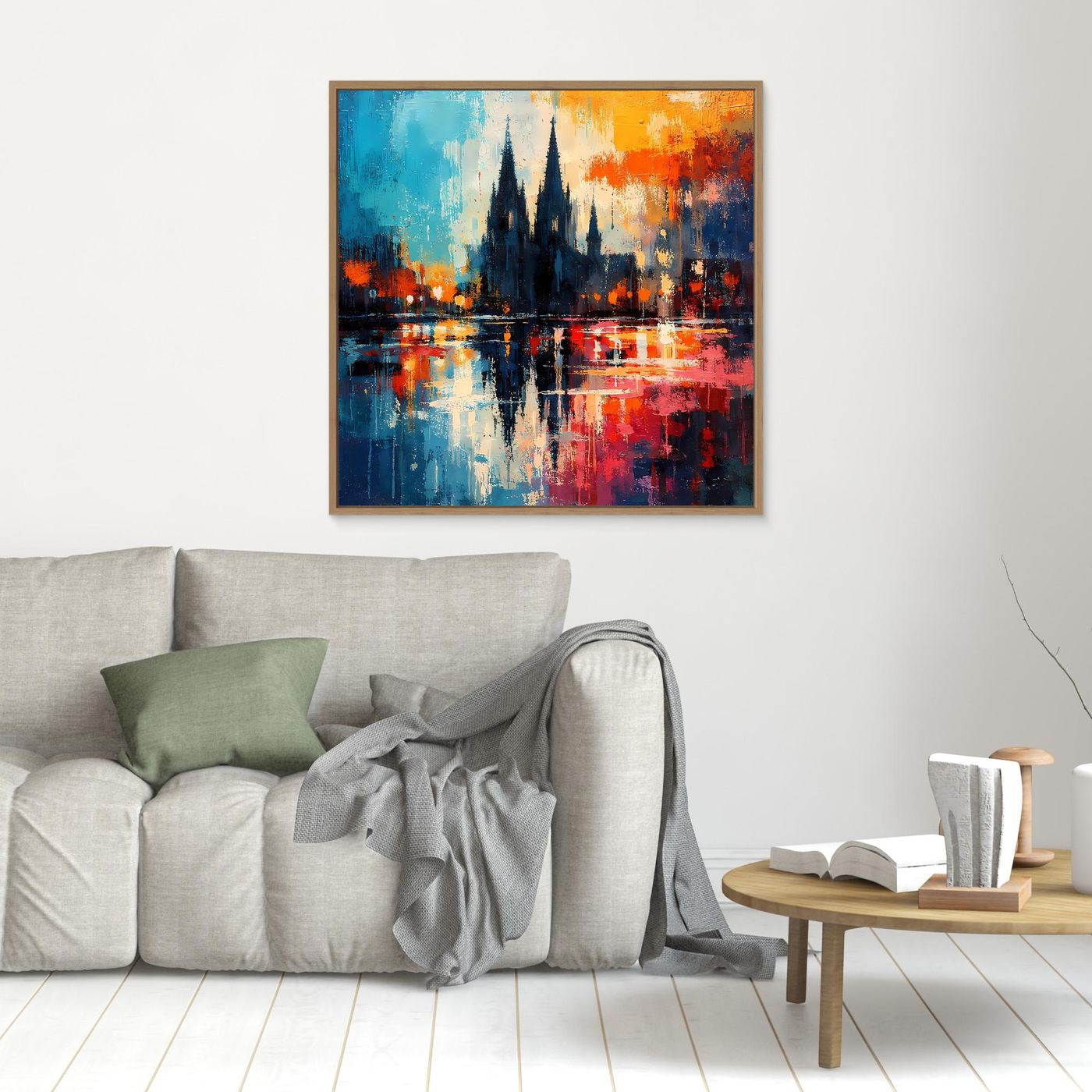Quadratisches Wandbild mit hellem Holzrahmen: abstrakte Köln-Dom-Silhouette mit Spiegelung.