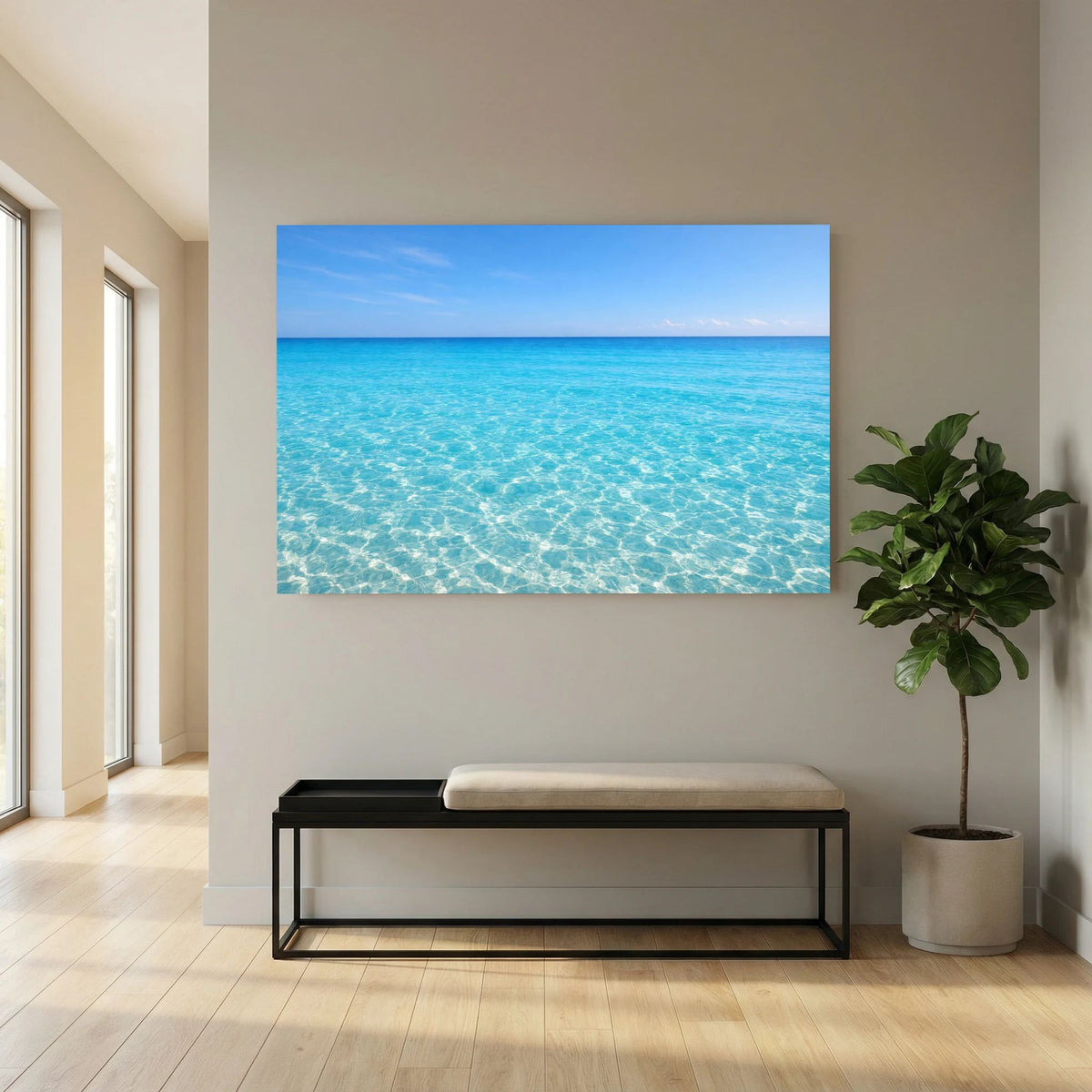 Wandbild im Querformat mit türkisblauem Meer über einer Bank in hellem Raum.