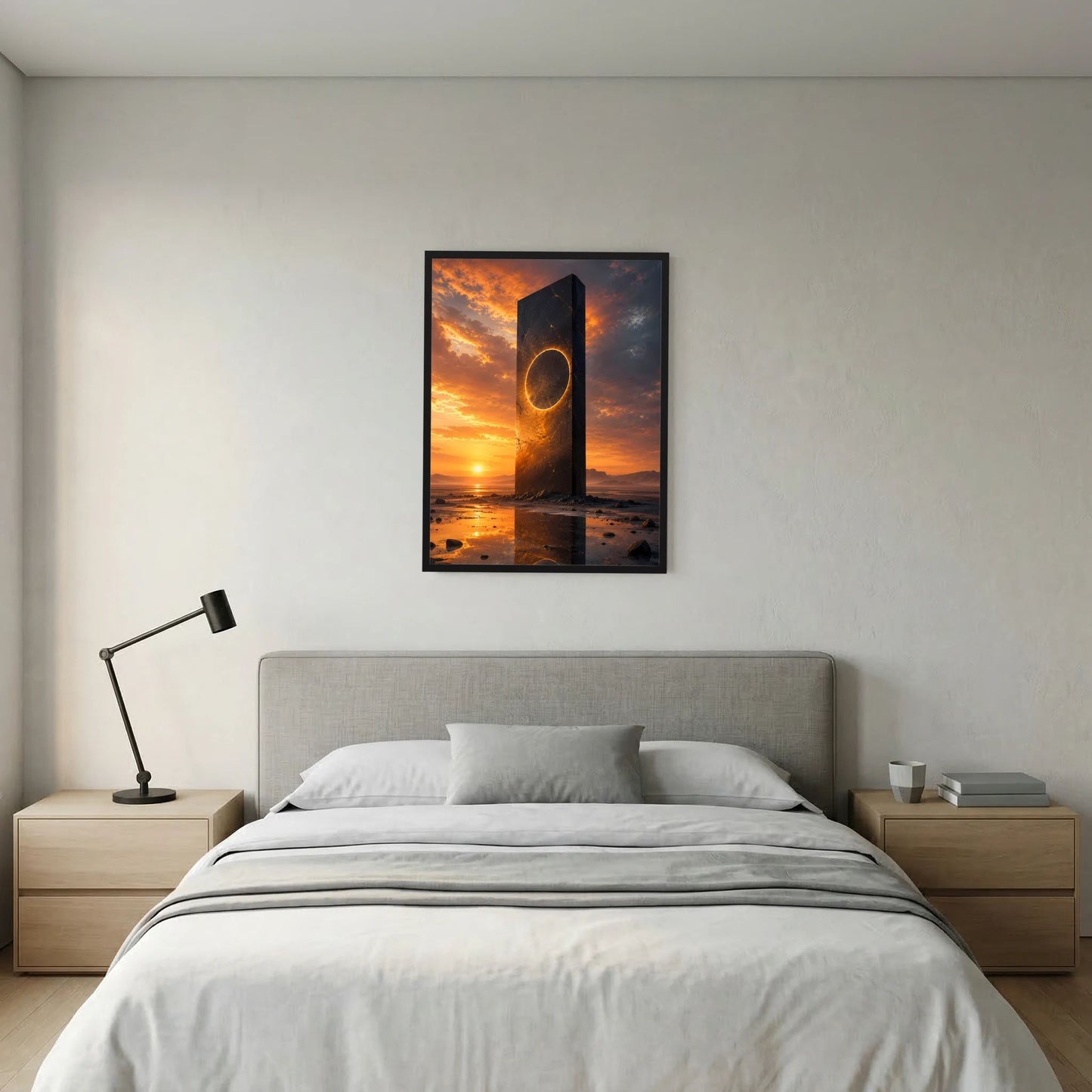 Hochformat-Poster: schwarzer Monolith mit goldener Ringöffnung im orange-dunklen Abendhimmel