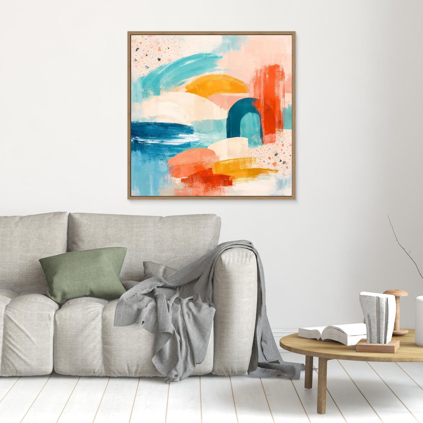 Light wood-framed abstract pastel canvas with teal, coral, blue, and yellow brushstrokes.