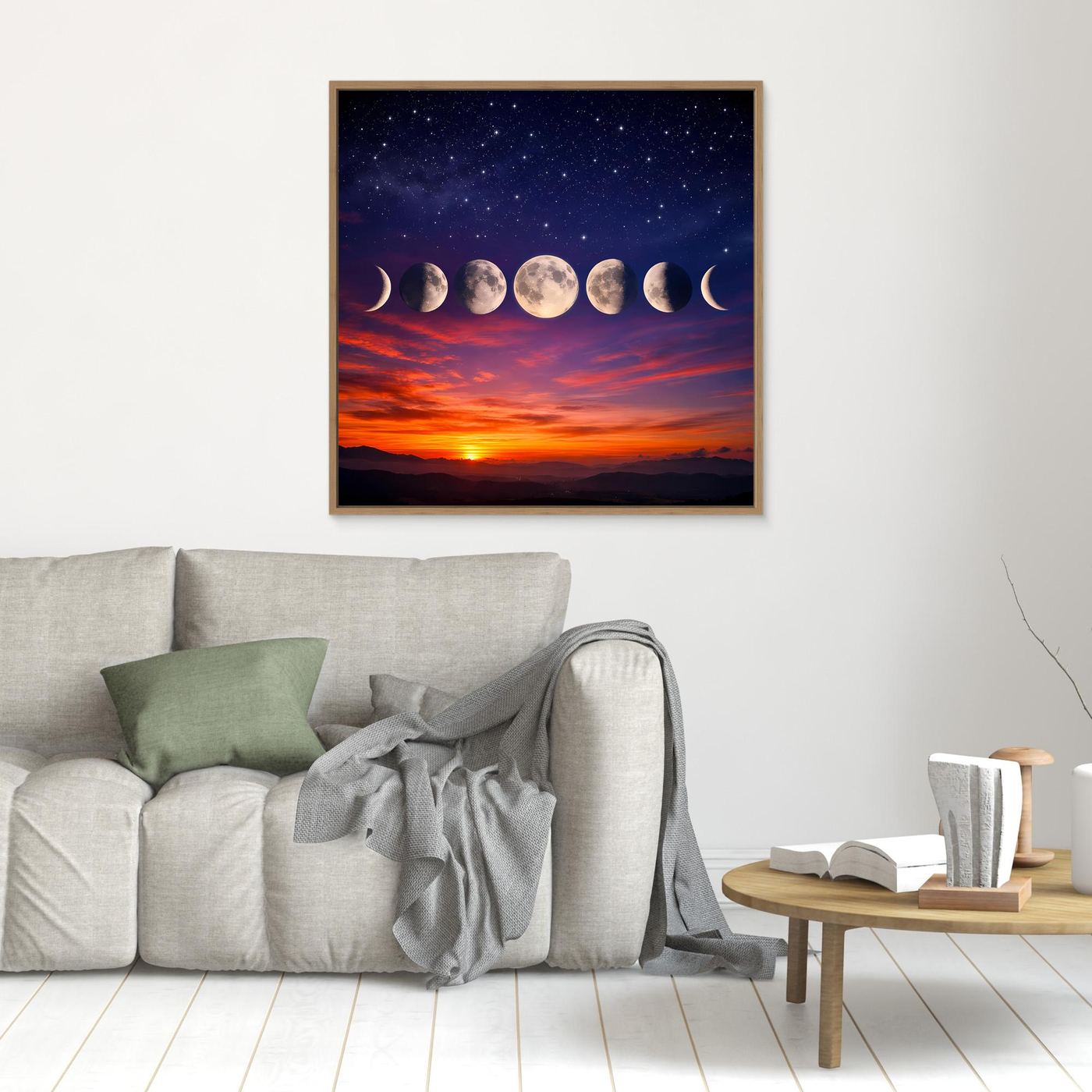 Leinwandbild mit Mondphasen über Sternenhimmel und Sonnenuntergang, braun gerahmt