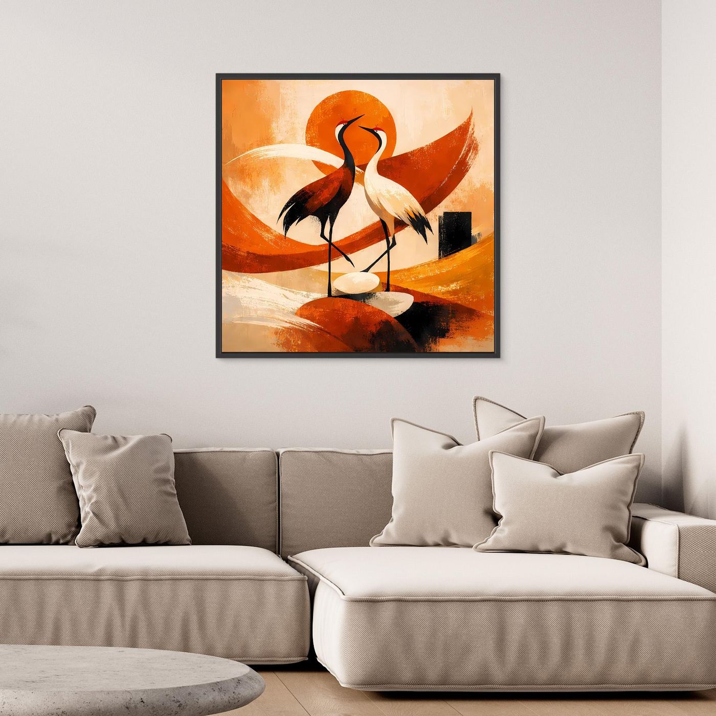 Leinwandbild mit Kranichen im schwarzen Rahmen, orangefarbenes Sonnenmotiv