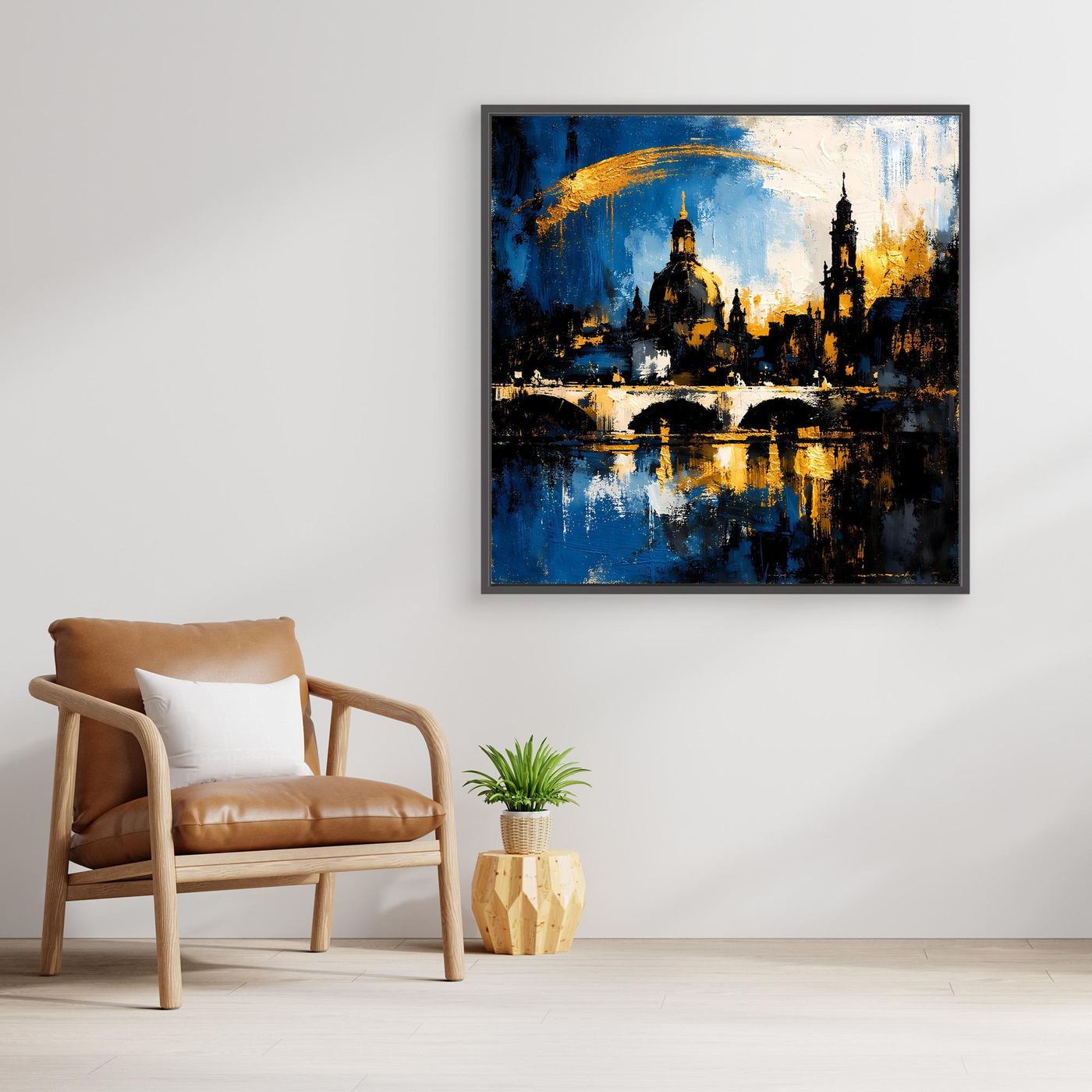 Leinwand-Wandbild mit abstrakter Skyline, blau-goldfarben, in dunklem Rahmen.