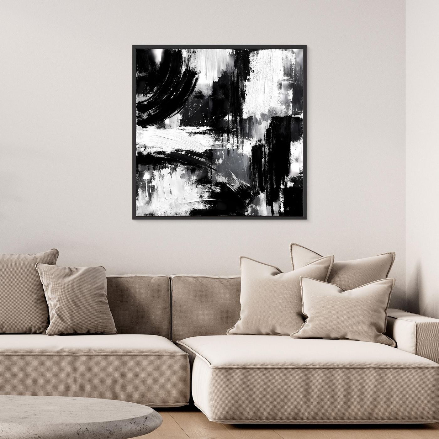 Square black-and-white abstract canvas painting in black frame