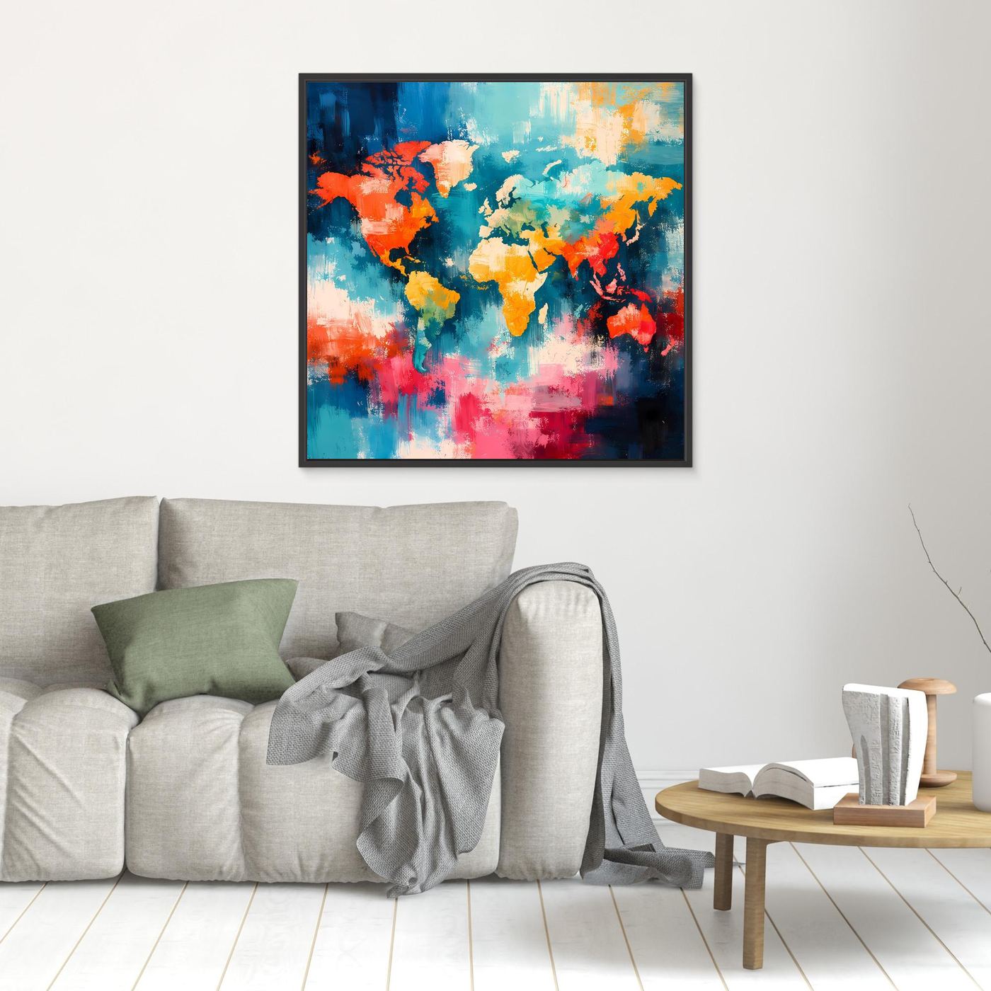 Abstract world map canvas with colorful splash-style continents in a black frame on wall