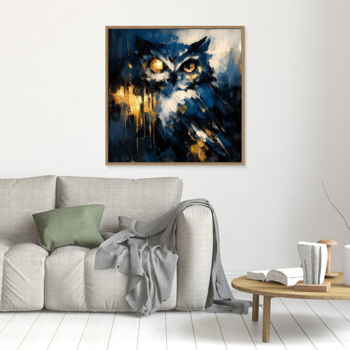 Abstraktes Eulen-Leinwandbild mit leuchtenden Augen in Blau und Gold, goldener Rahmen