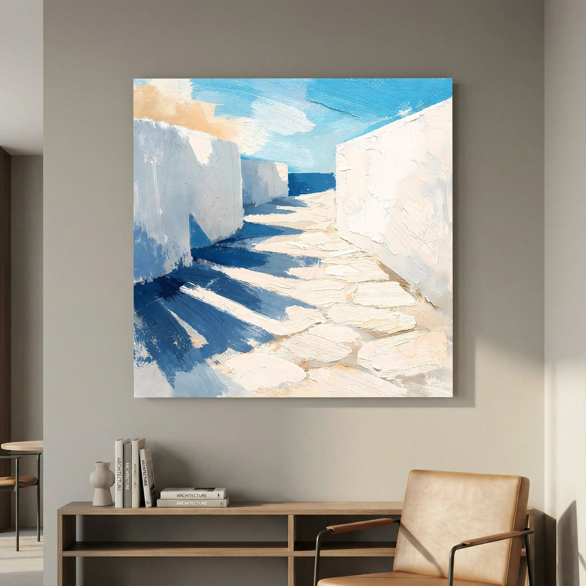 Quadratisches Wandbild mit abstrakter Küstengasse, weißen Wänden, blauem Himmel und Licht