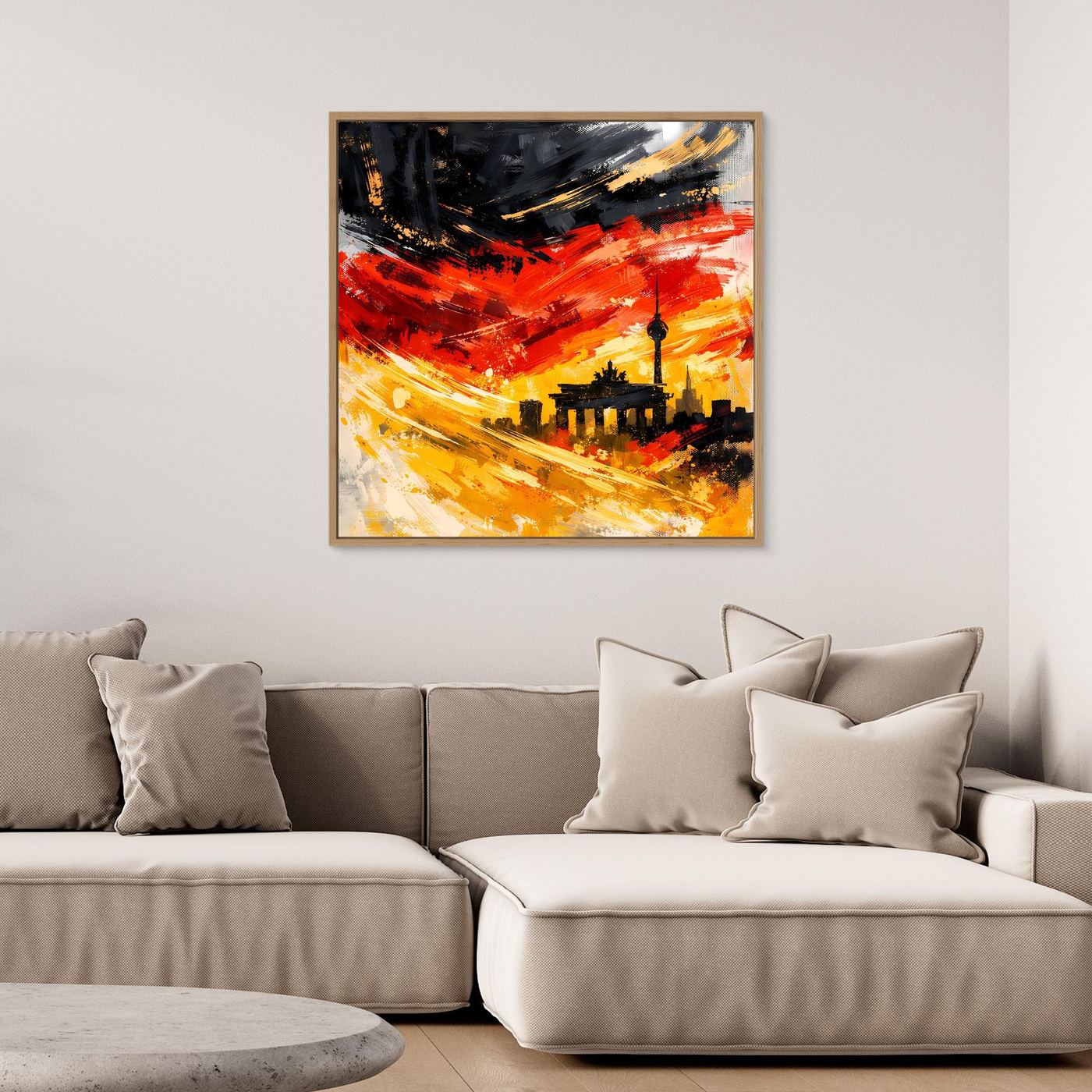 Abstraktes Leinwandbild mit Skyline, kräftigen Rot- und Gelbtönen, schwarzer Turm im Rahmen