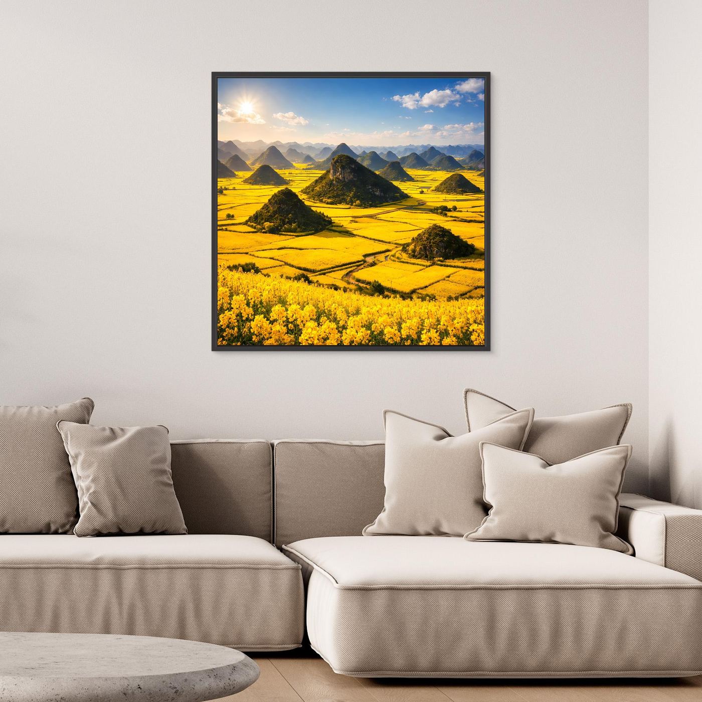 Leinwandbild mit goldenem Rapsfeld und Karstbergen im schwarzen Rahmen