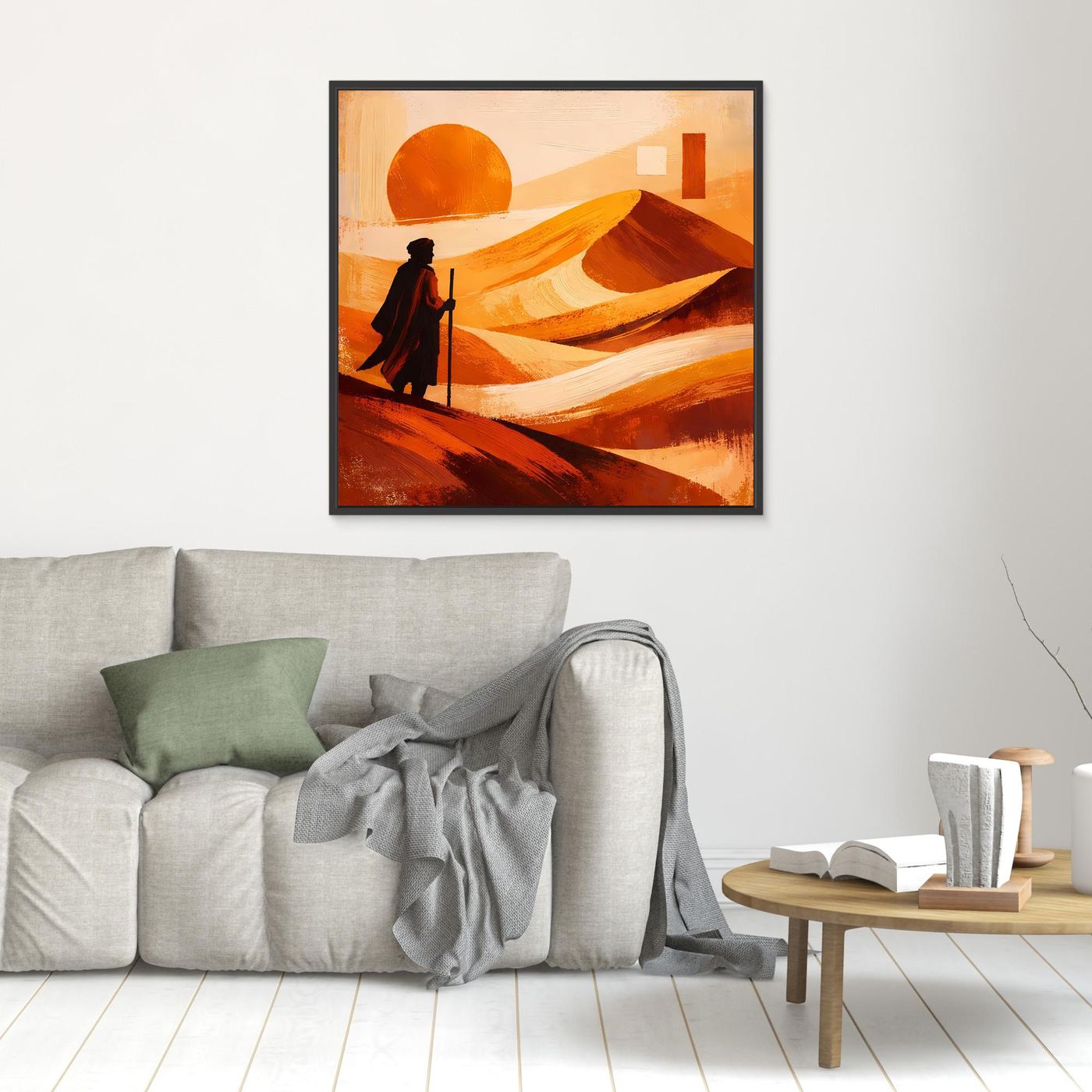 Leinwandbild mit orangefarbener Abstrakt-Wüste, Sonne und Wanderfigur, schwarzer Rahmen