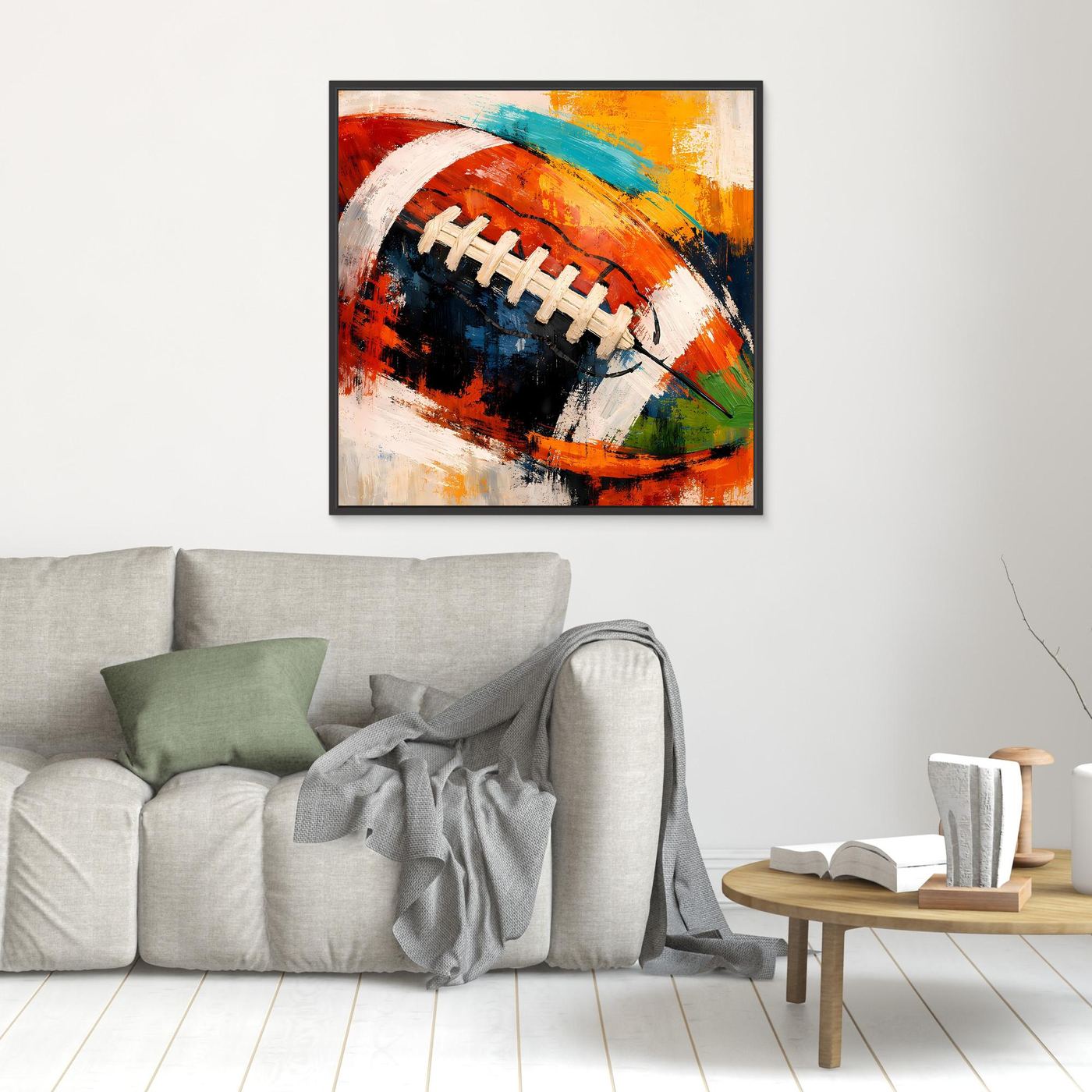 Leinwandbild mit abstraktem Football-Motiv in Rot, Blau und Orange, mit schwarzem Rahmen