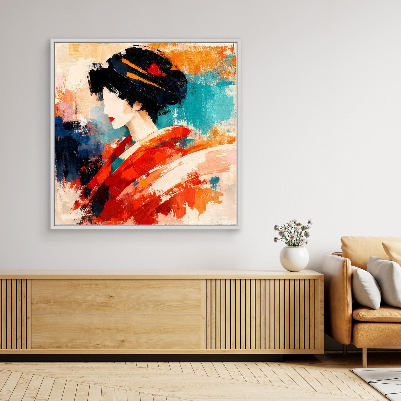 Framed canvas wall art of a geisha in a red and teal abstract kimono, white frame