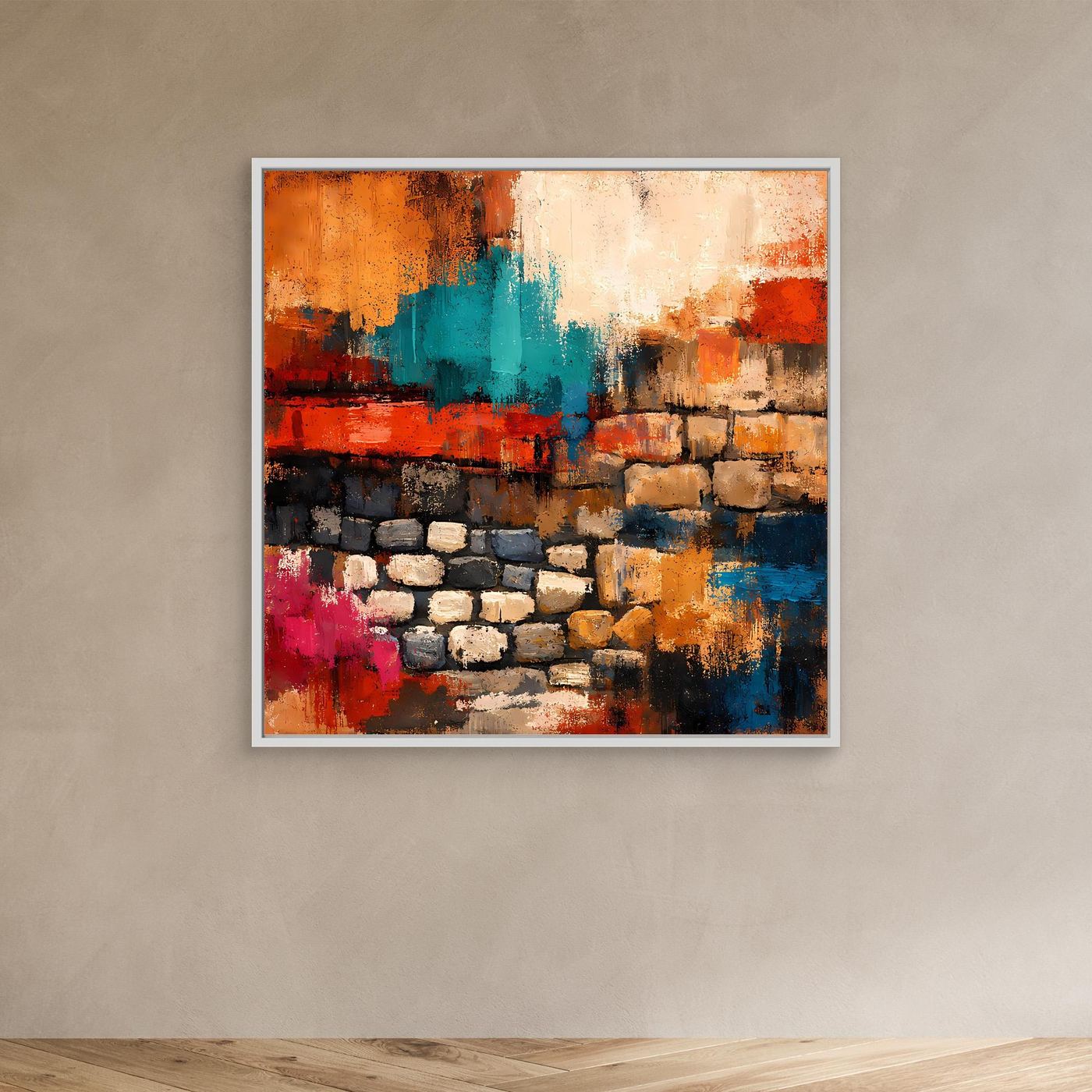 Wandbild mit abstrakter Steinmauer in orange, türkis, rot und blau, in hellem Rahmen