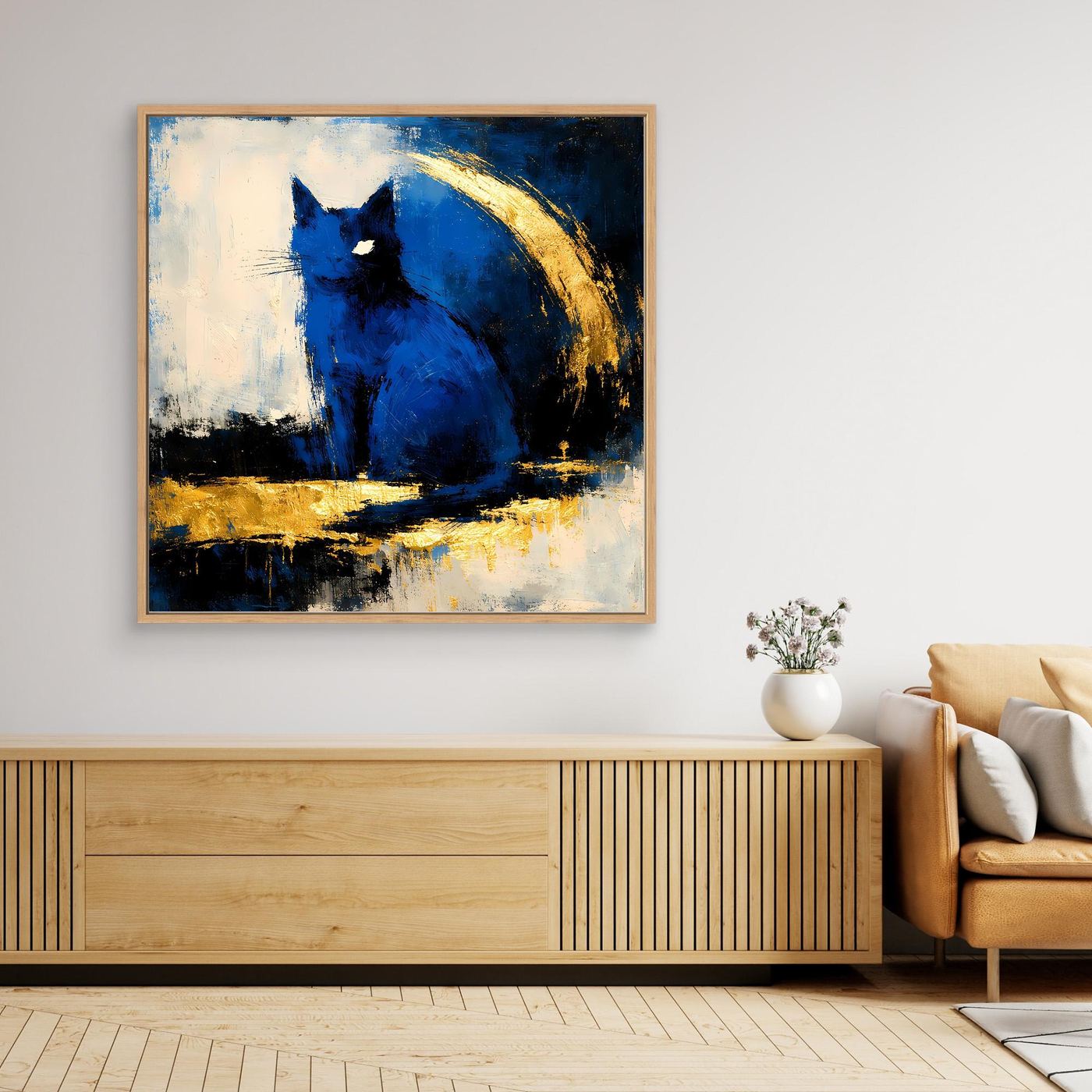 Gerahmtes Leinwandbild mit abstraktem Elefantenmotiv, blau-goldene Pinseltextur im hellen Rahmen