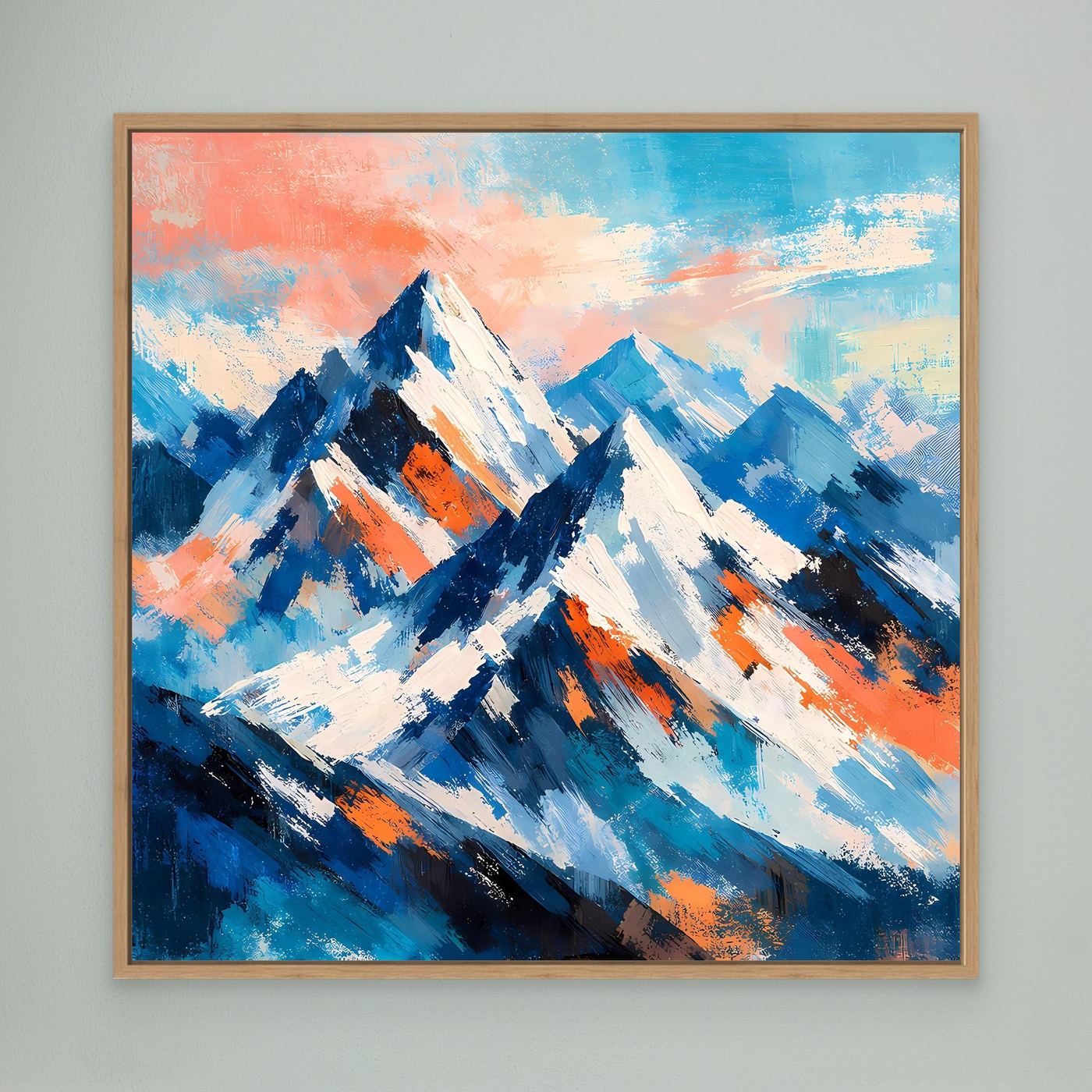 Leinwandbild Schneeberge in Blau- und Orangetönen, gerahmt in Holz
