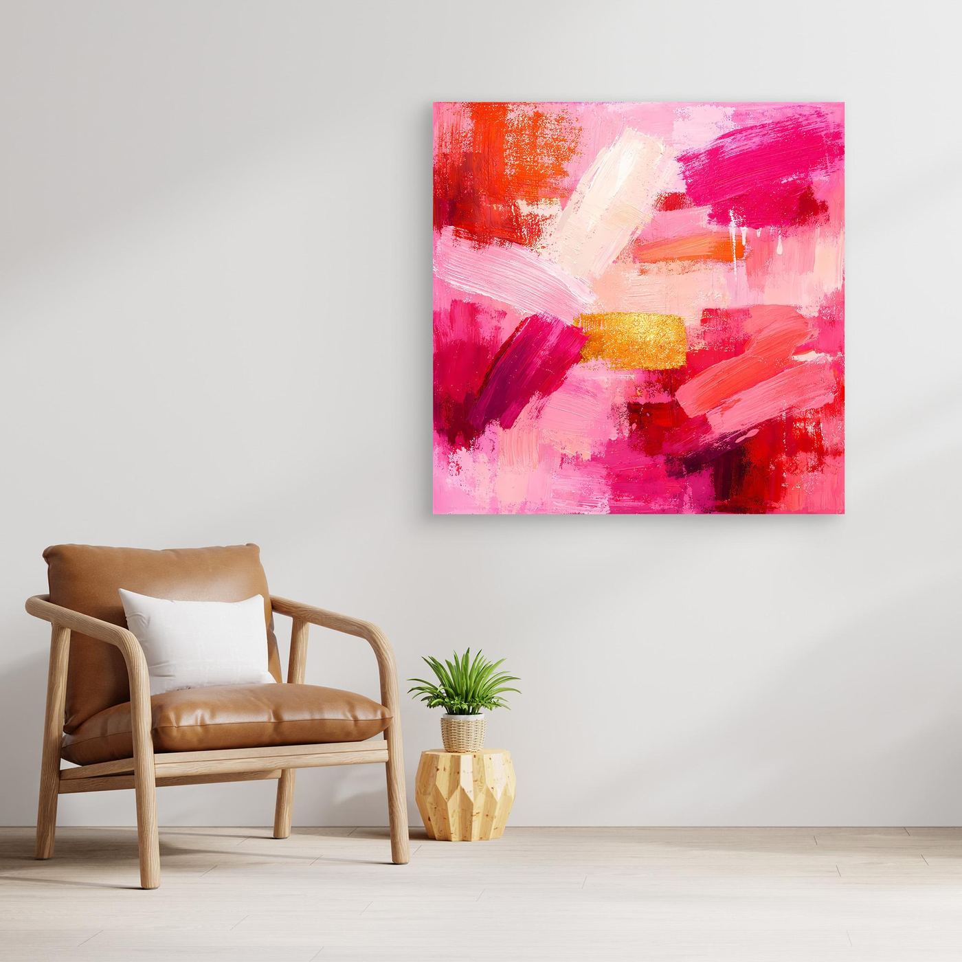 Abstract canvas wall art with vivid pink and rose strokes and a small gold highlight.