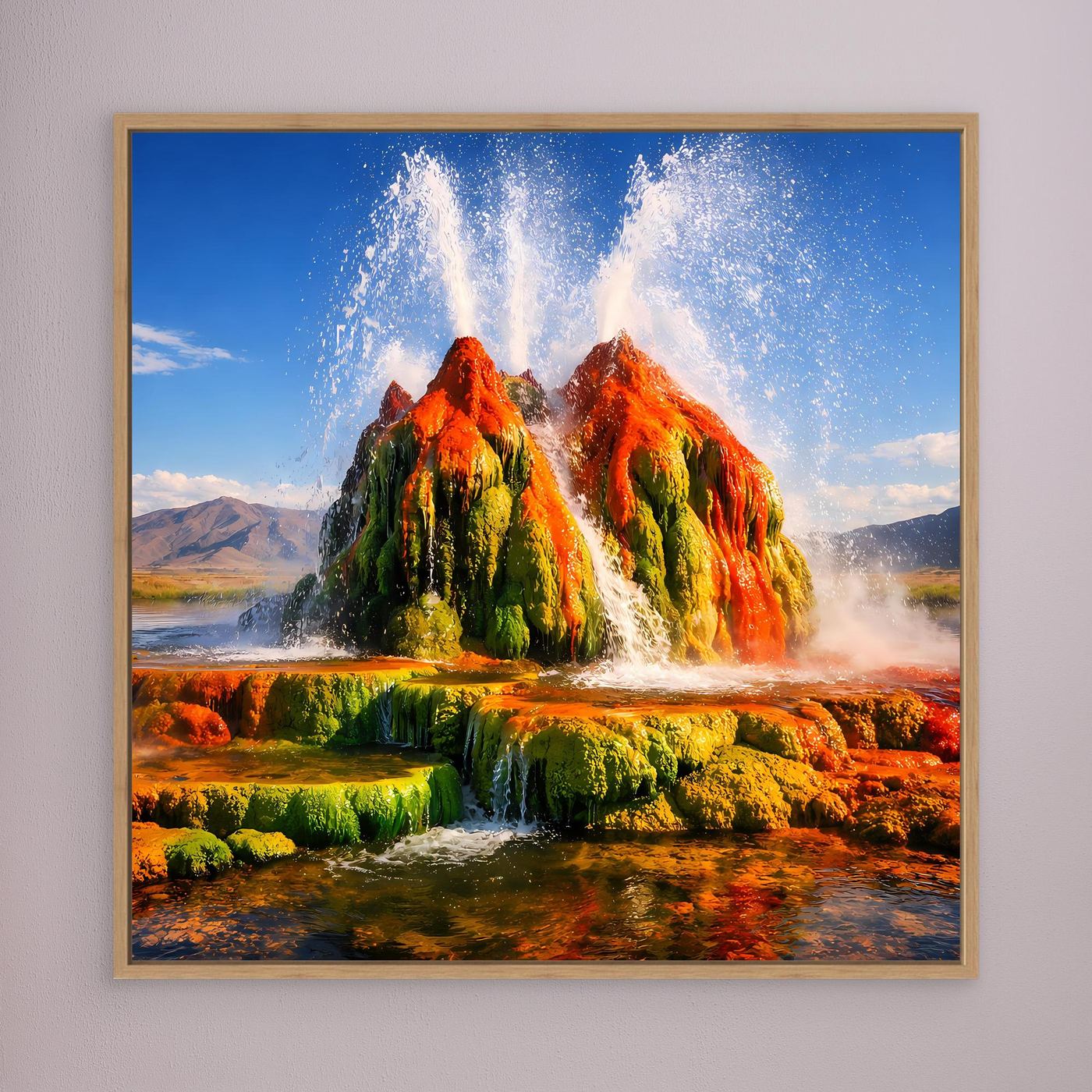 Gerahmtes Leinwandbild mit Geysir-Fontänen über Landschaft in Grün, Orange und Blau