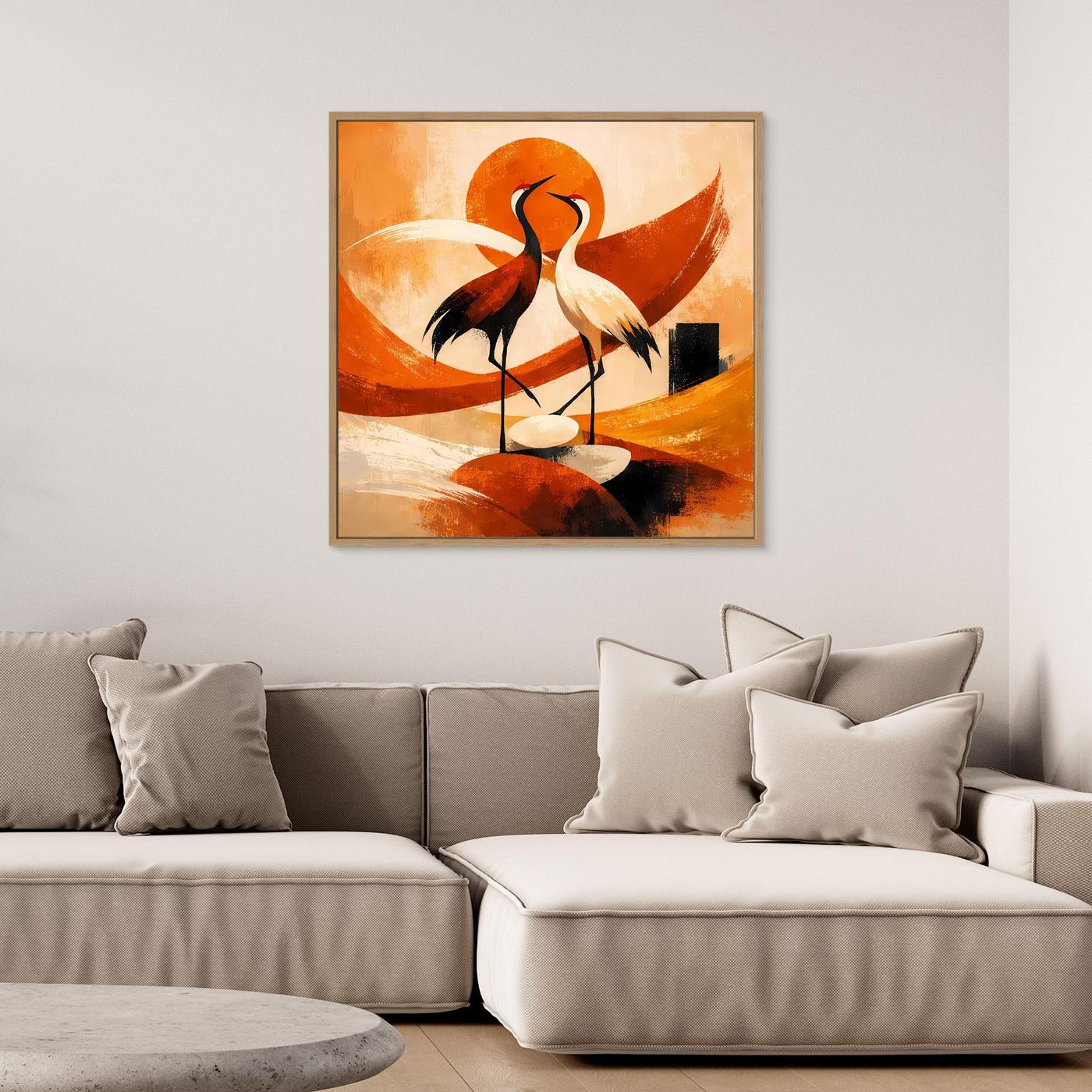 Leinwandbild mit Kranichen im goldfarbenen Rahmen, orange-weißes Sonnenmotiv