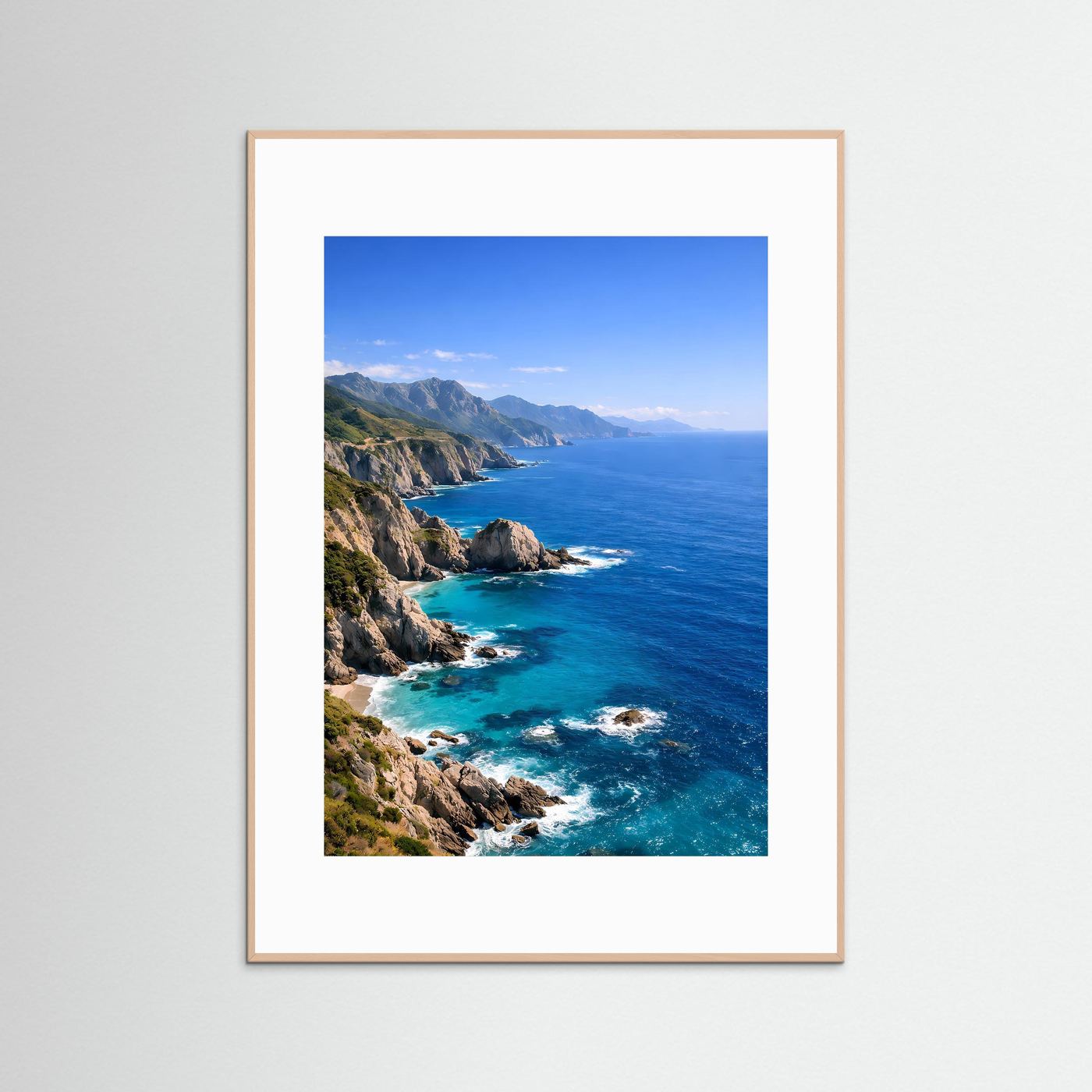 Meerposter mit Felsen an der Küste und blauem Ozean, heller Rahmen, hochformat