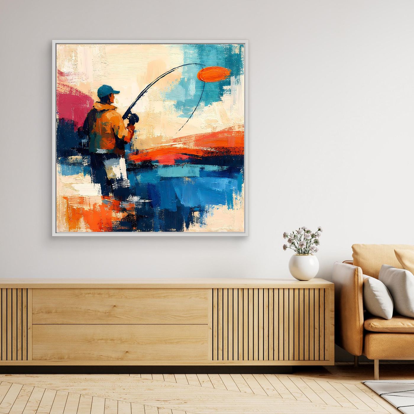 Abstract fishing canvas wall art with orange, blue, and dark figures; light frame