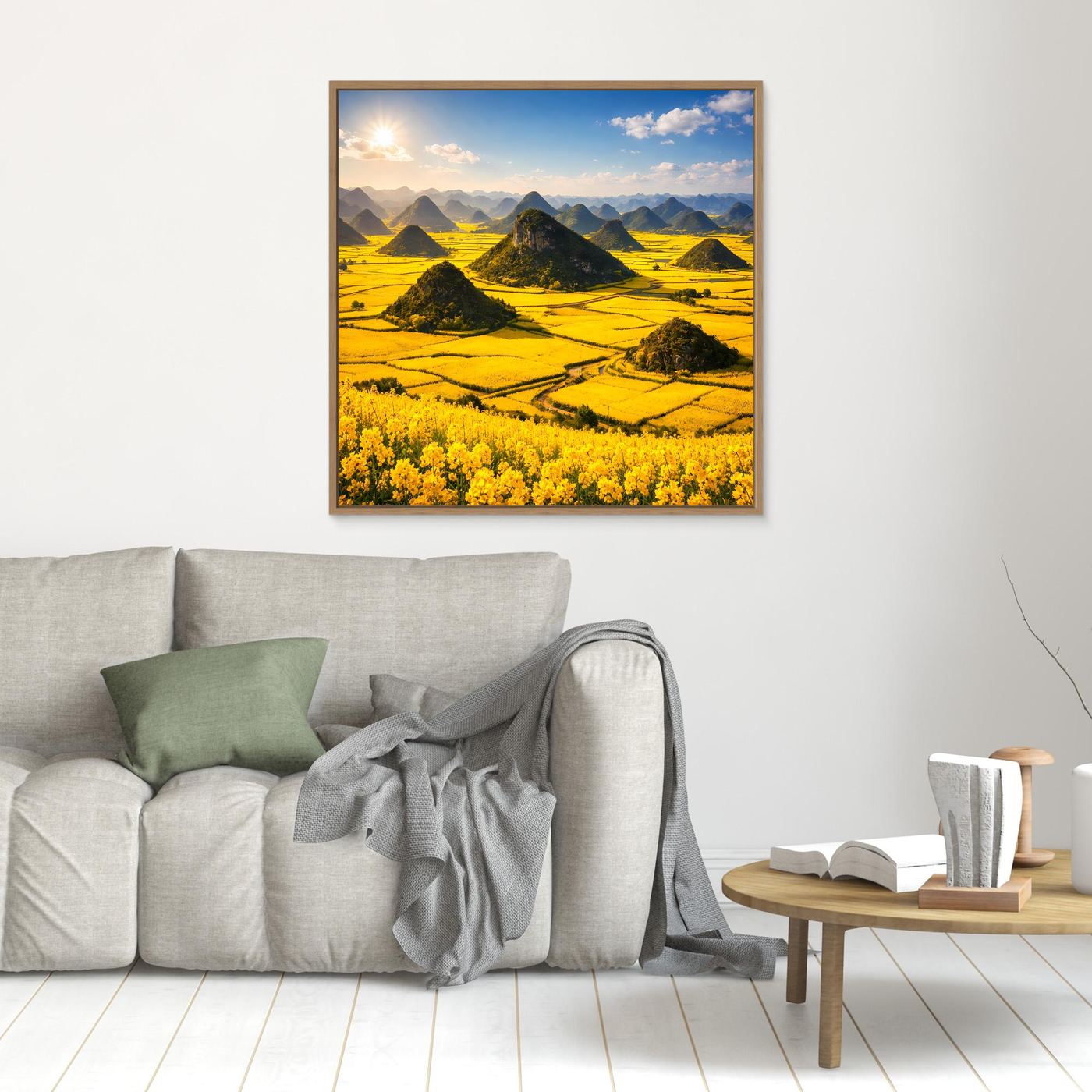 Leinwandbild: goldenes Rapsfeld mit Karstbergen, braun gerahmt.