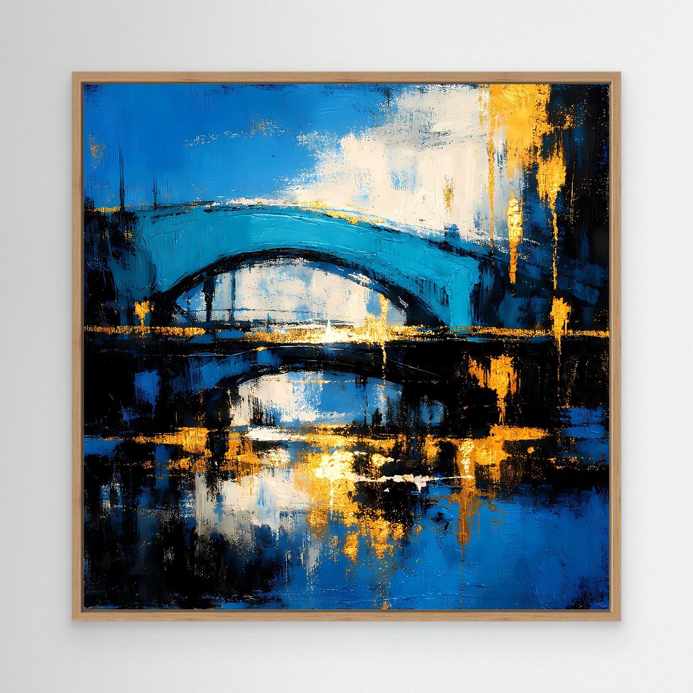 Abstraktes Wandbild in hellem Holzrahmen, blaue Brücke über Wasser mit goldenen Highlights