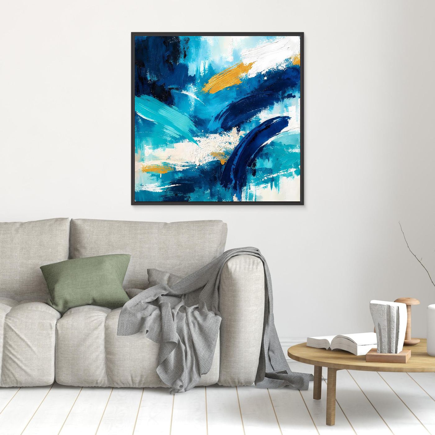 Abstract blue and gold canvas wall art, black frame on wall