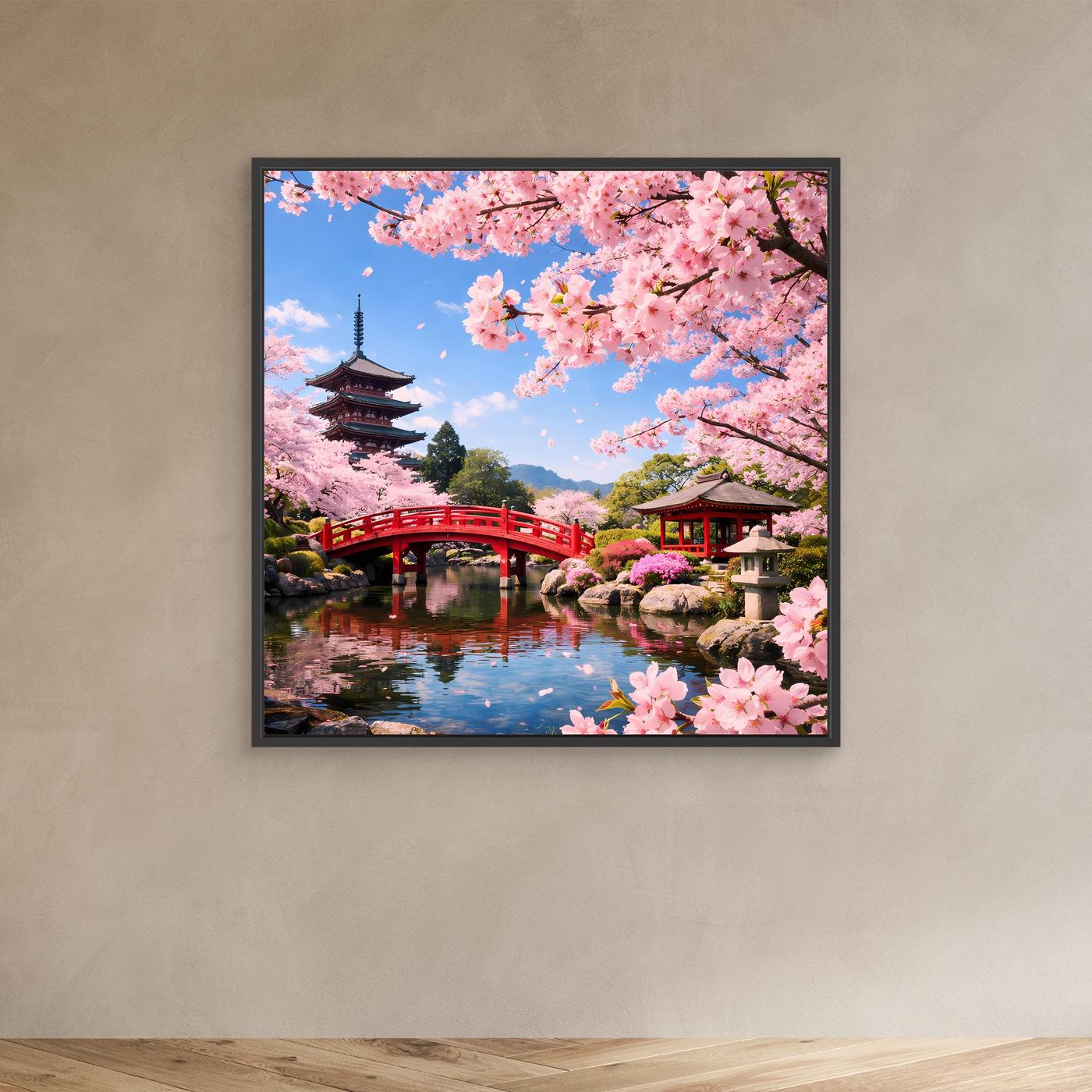 Leinwandbild Japanischer Garten mit Kirschblüten, roter Brücke und Pagode im schwarzen Rahmen