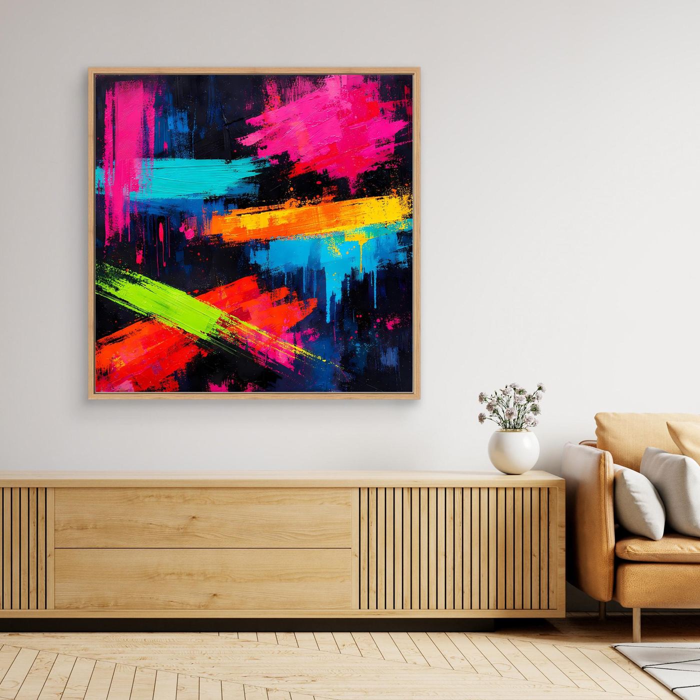 Abstraktes Leinwand-Wandbild mit Neon-Farbstrichen in Pink, Blau, Orange und Grün im goldenen Rahmen