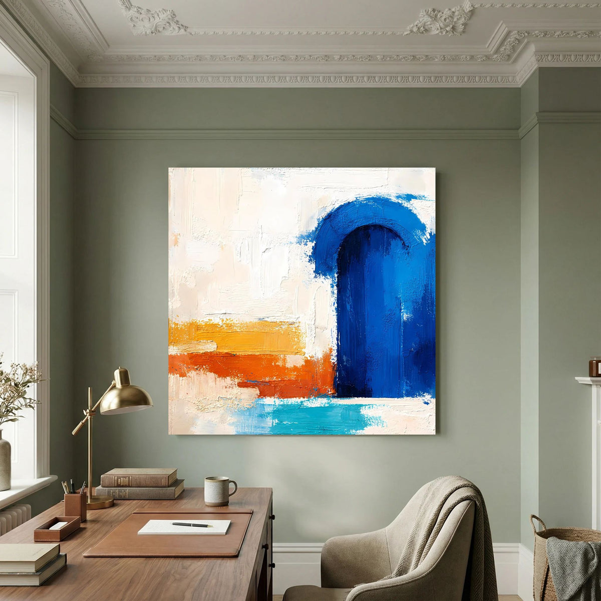 Weiß gerahmtes Leinwandbild mit blauem Torbogen und abstrakten Orange-Blau-Streifen