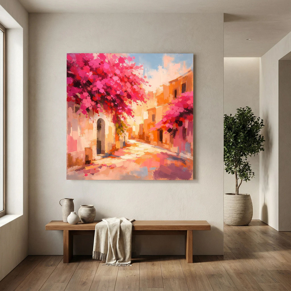 Leinwandbild Gasse mit rosa Blütenzweigen, leuchtendem Orange-Licht und hellem Himmel