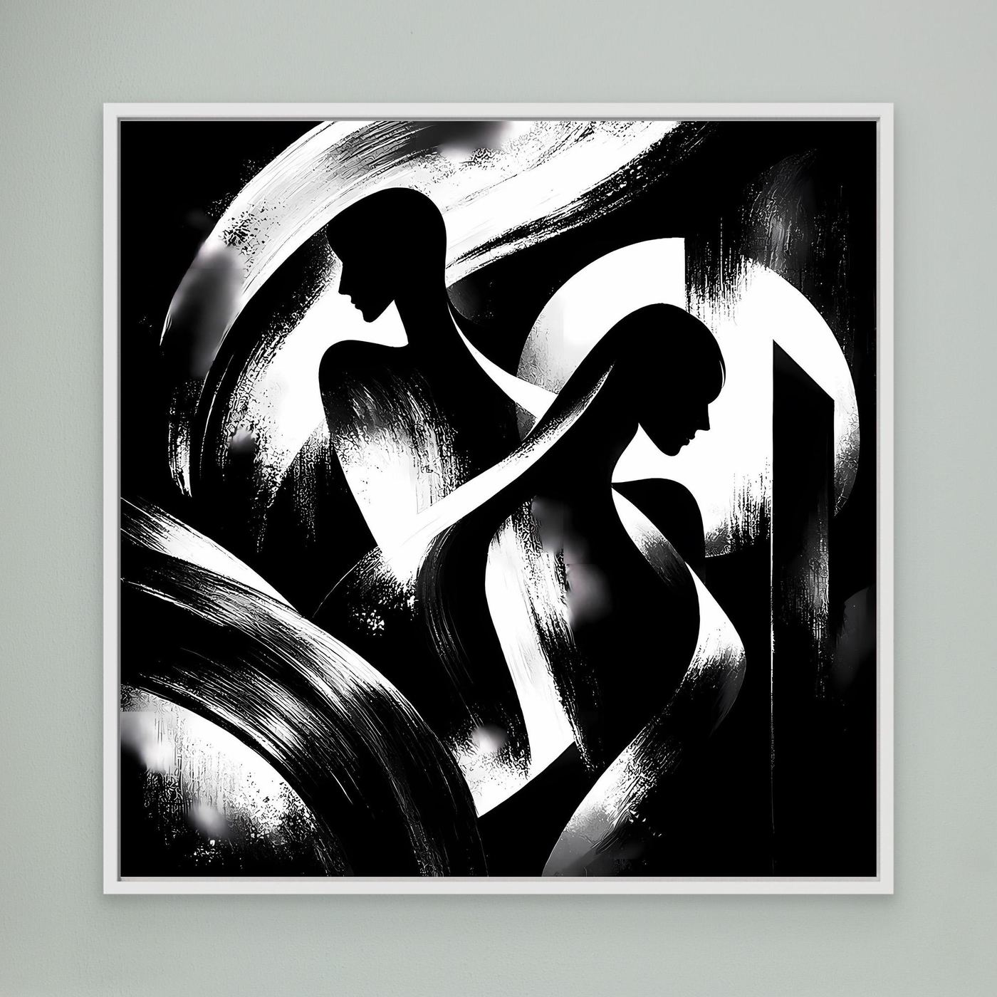 Schwarz-weißes Leinwand-Wandbild mit abstrakten Silhouetten, weiß gerahmt.