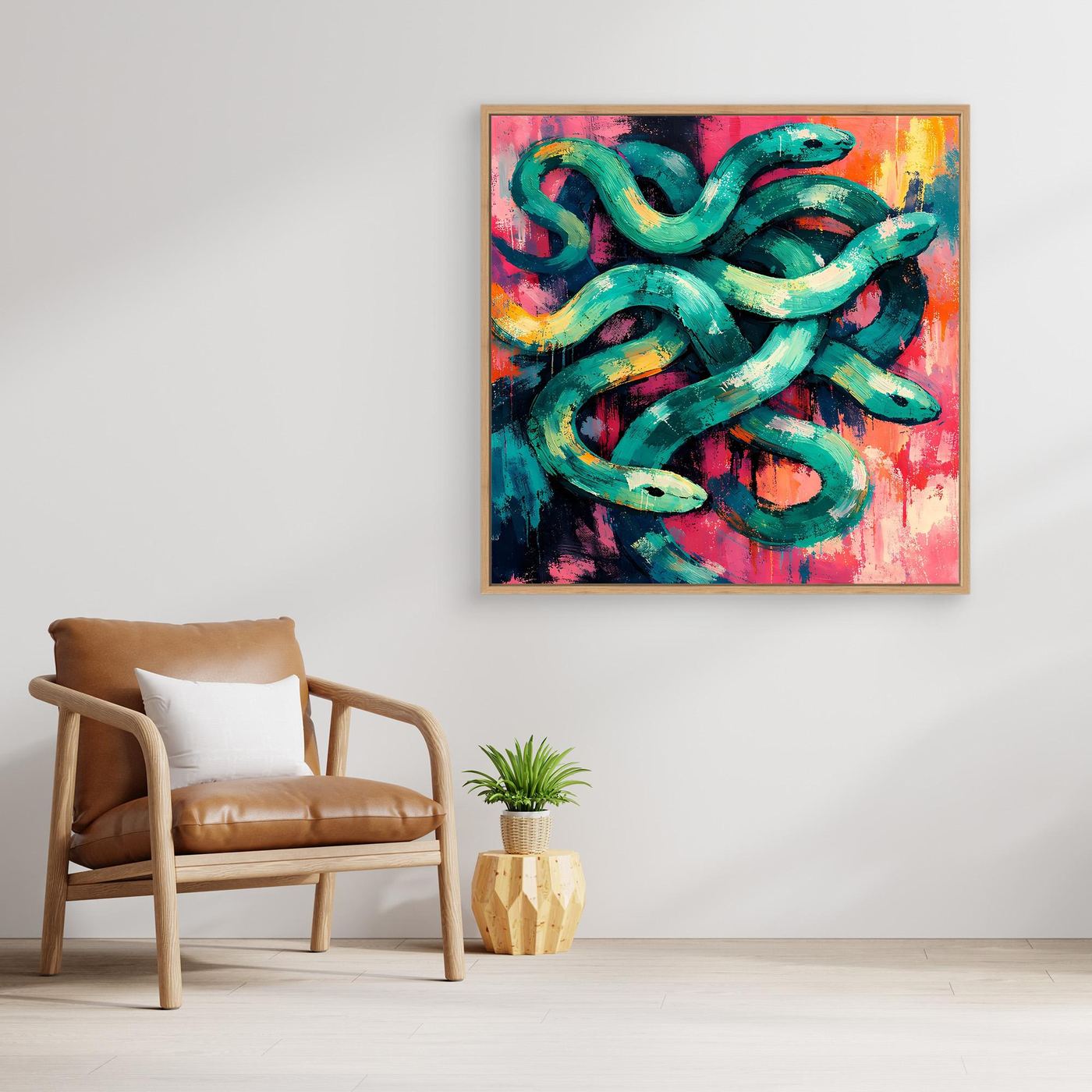 Framed abstract snake canvas wall art with teal coils and pink, orange, and purple tones.