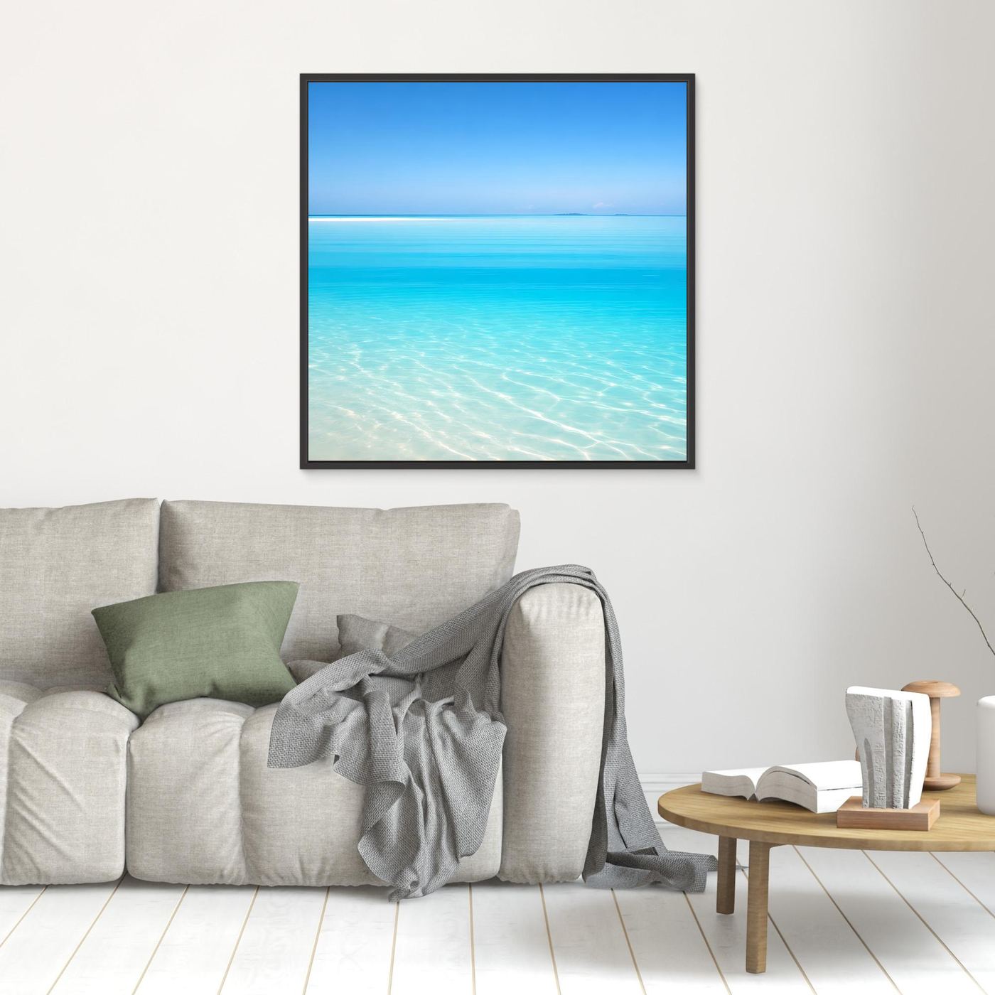 Leinwandbild mit schwarzem Rahmen, türkisblaues Meer mit sanften Wellen