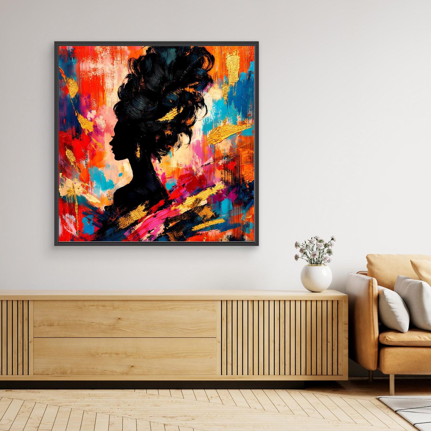 Abstraktes Leinwandbild mit schwarzer Silhouette, farbige Farbspritzer, schwarz gerahmt