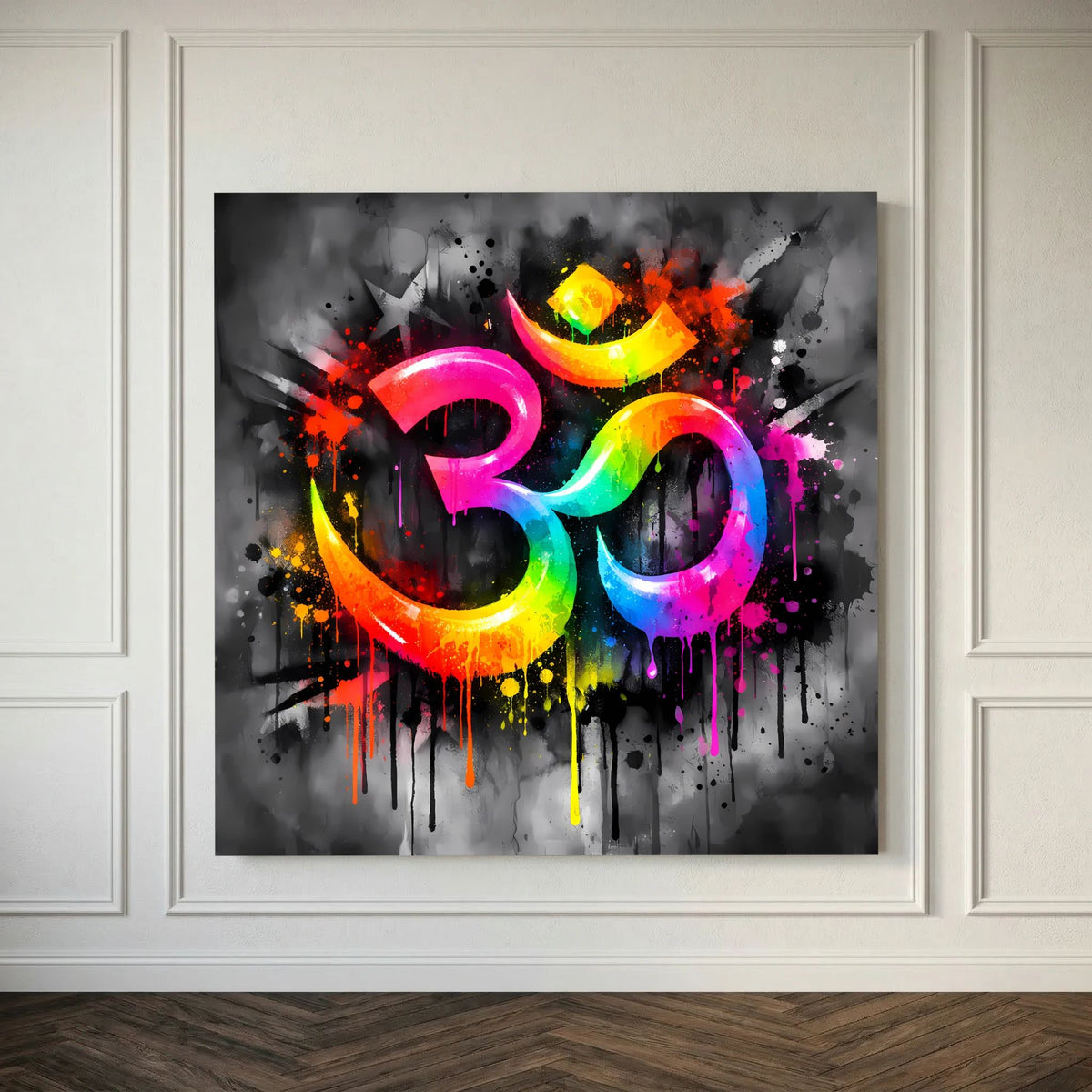 Keilrahmen-Leinwandbild mit farbigem Om-Symbol, Spritzdekor und Farbklecksen auf Grau