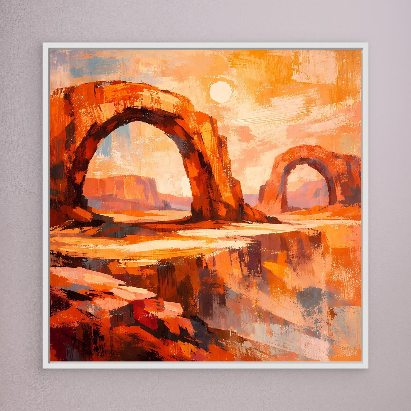Wandbild mit Wüstenbogen-Motiv in Orange und Rot, mit hellem Rahmen