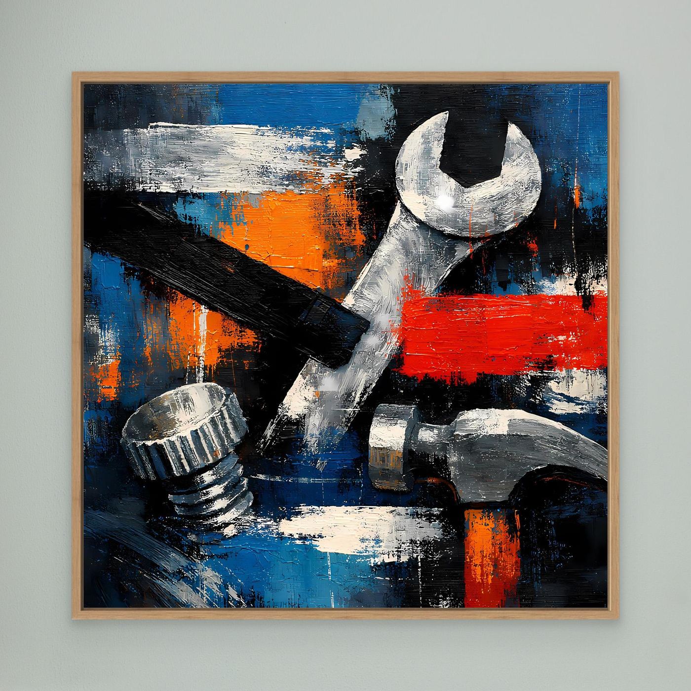 Abstract tools canvas wall art with wrench in oak frame, red and blue paint strokes